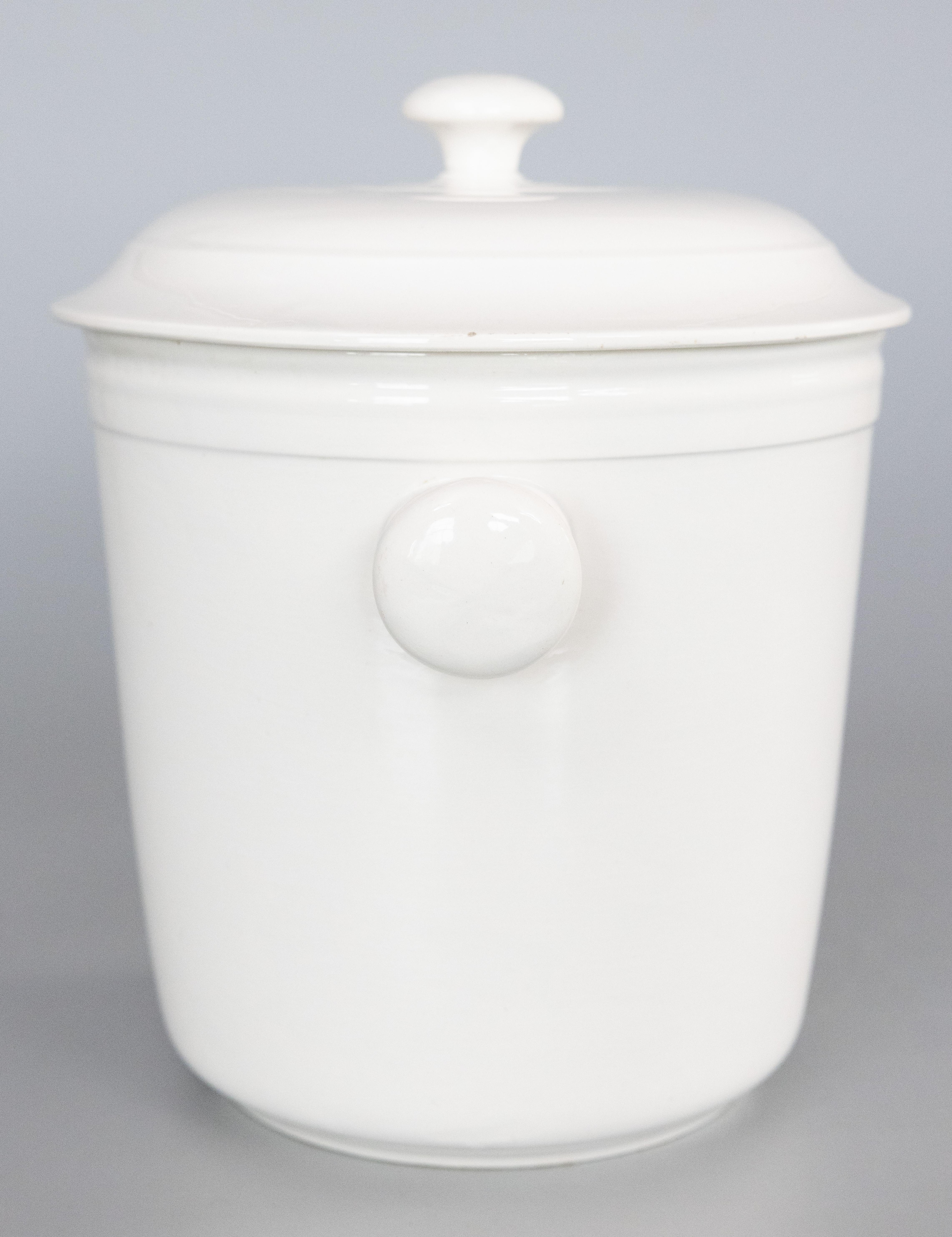 A rare large antique French white ironstone lidded ice bucket, circa 1890. Made by famous French pottery maker Creil et Montereau in the Oise Department of France. Marked on reverse. A highly collectible and hard to find piece of French ironstone in