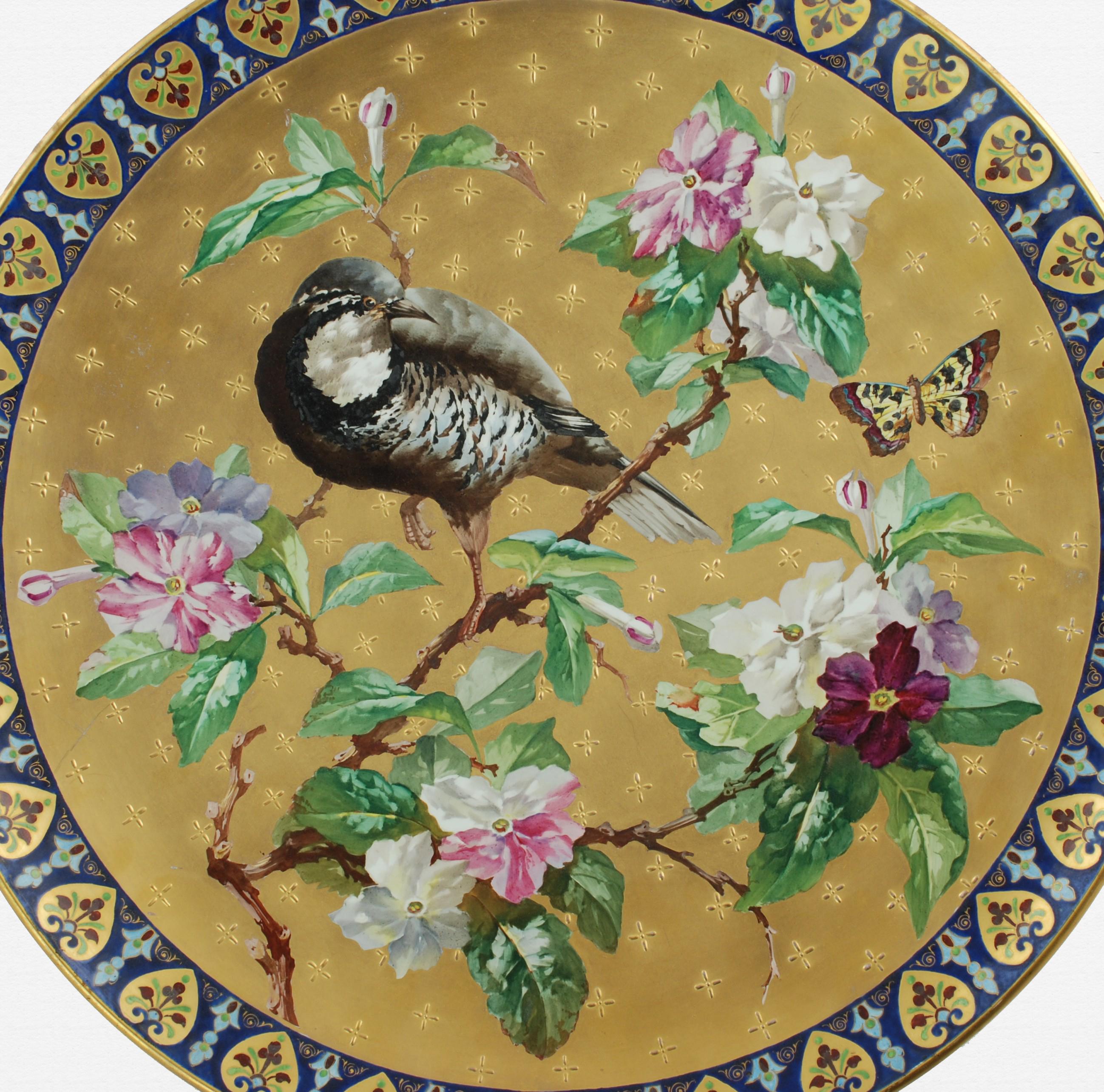This outstanding hand painted 19th century French ceramic charger was made by Hautin Boulenger & Cie at Creil & Montereau. The highly detailed Aesthetic Movement charger features polychrome decoration depicting a Japanese quail perched in a