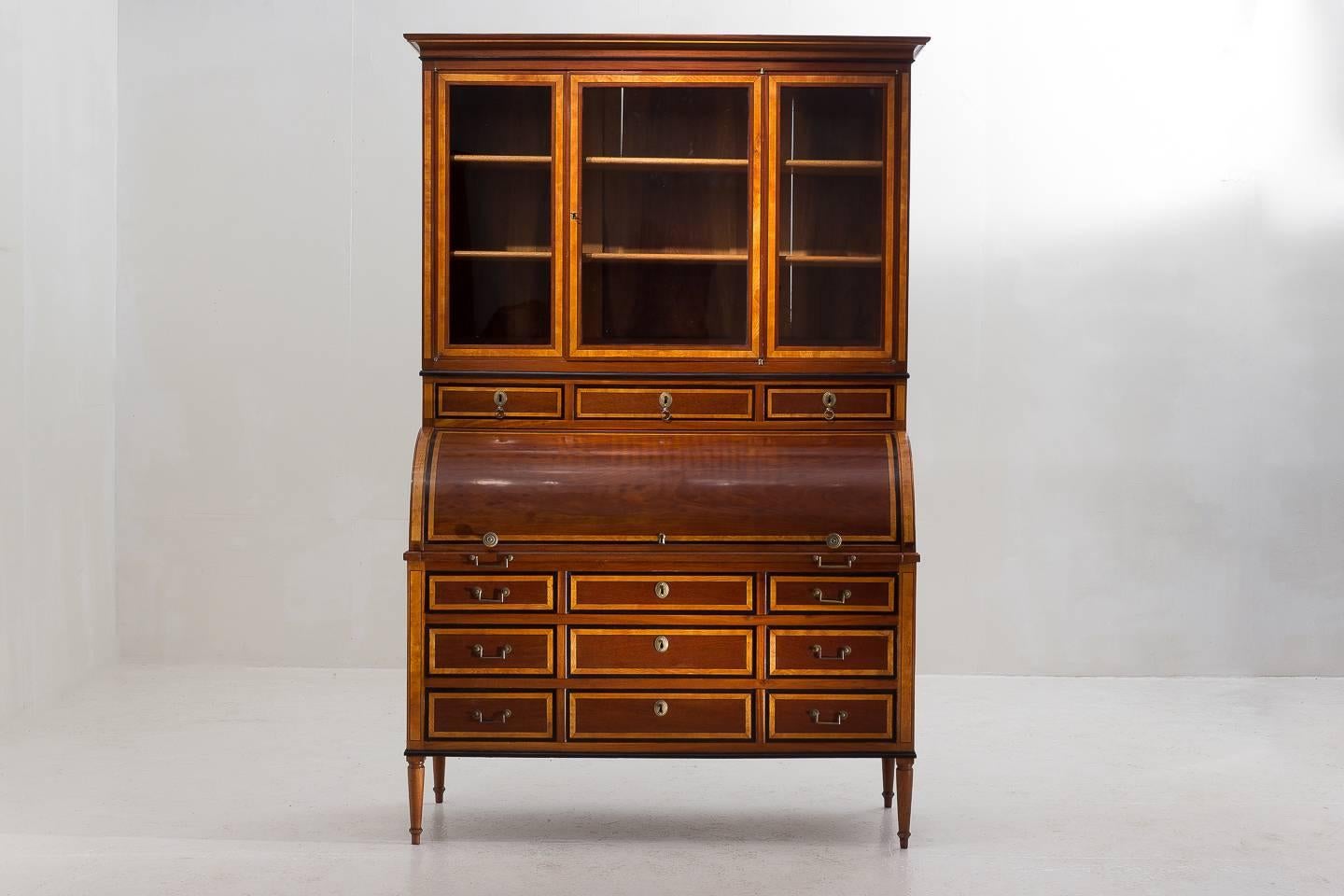 An exceptional quality French 19th century cylinder bureau cabinet in mahogany and satinwood with provenance.
 
  