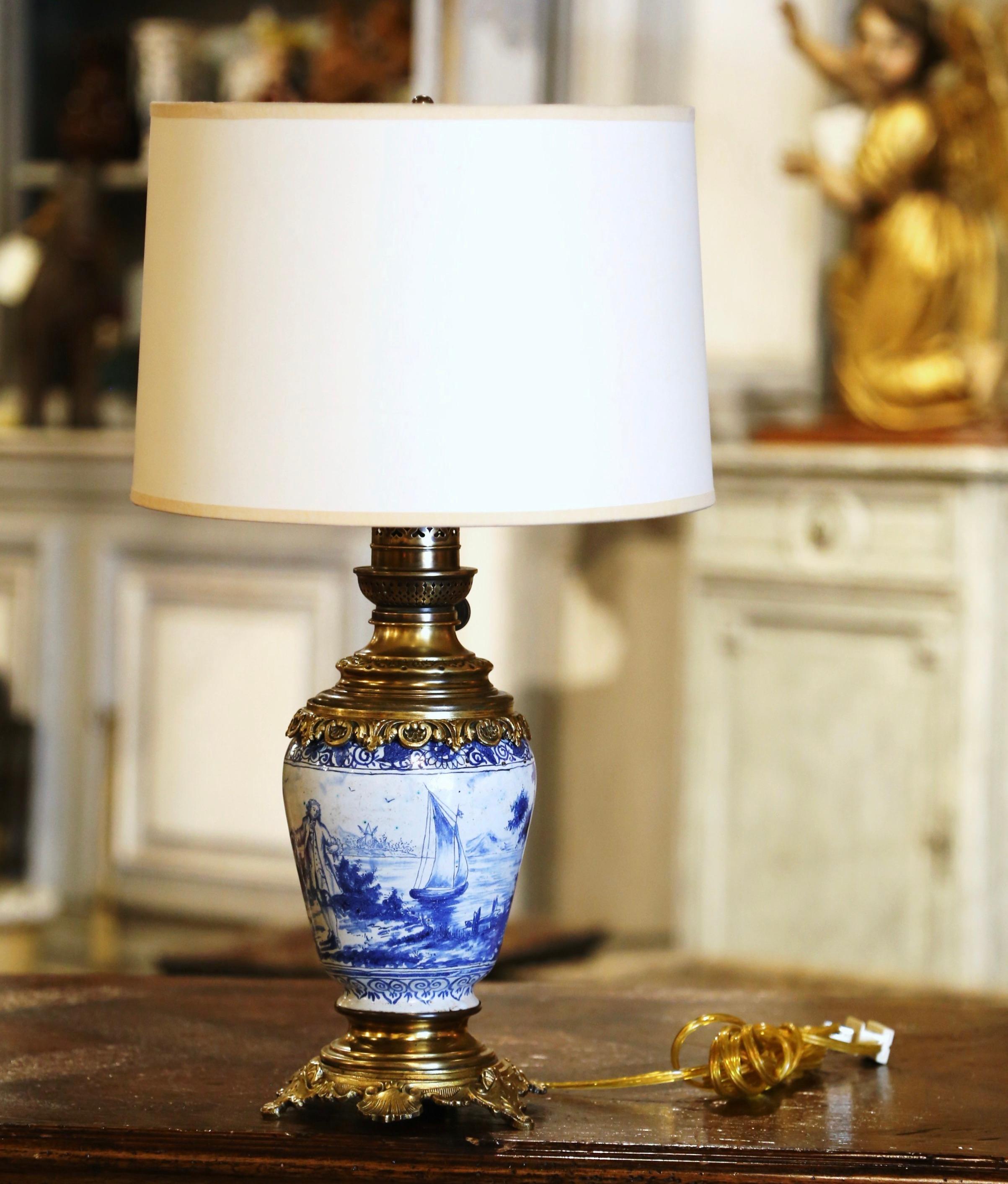Gilt 19th Century French Delft Blue and White Painted Porcelain and Brass Oil Lamp For Sale