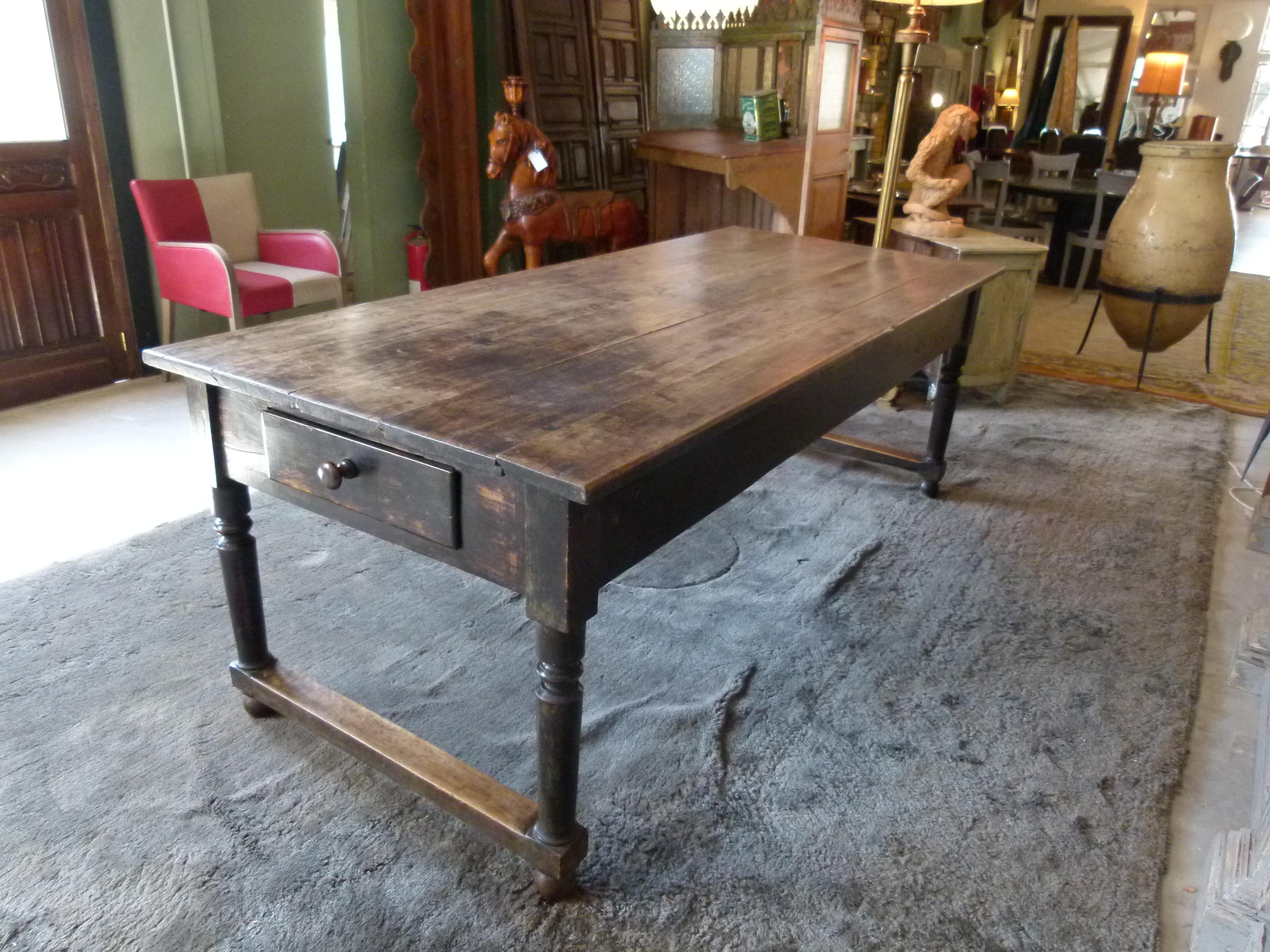 Large 19th century French dining table in country style, made of Walnut with one drawer at each end of the table.
Ideal as kitchen table, it can bear 6-8 diners.
 

 