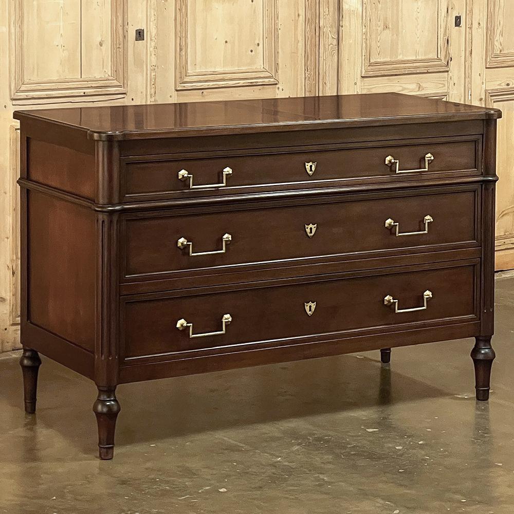 19th Century French Directoire mahogany Commode exudes the understated elegance for which the style is world renowned! Crafted from exotic mahogany imported from the Americas during the last century, it features slightly protruding, rounded corners