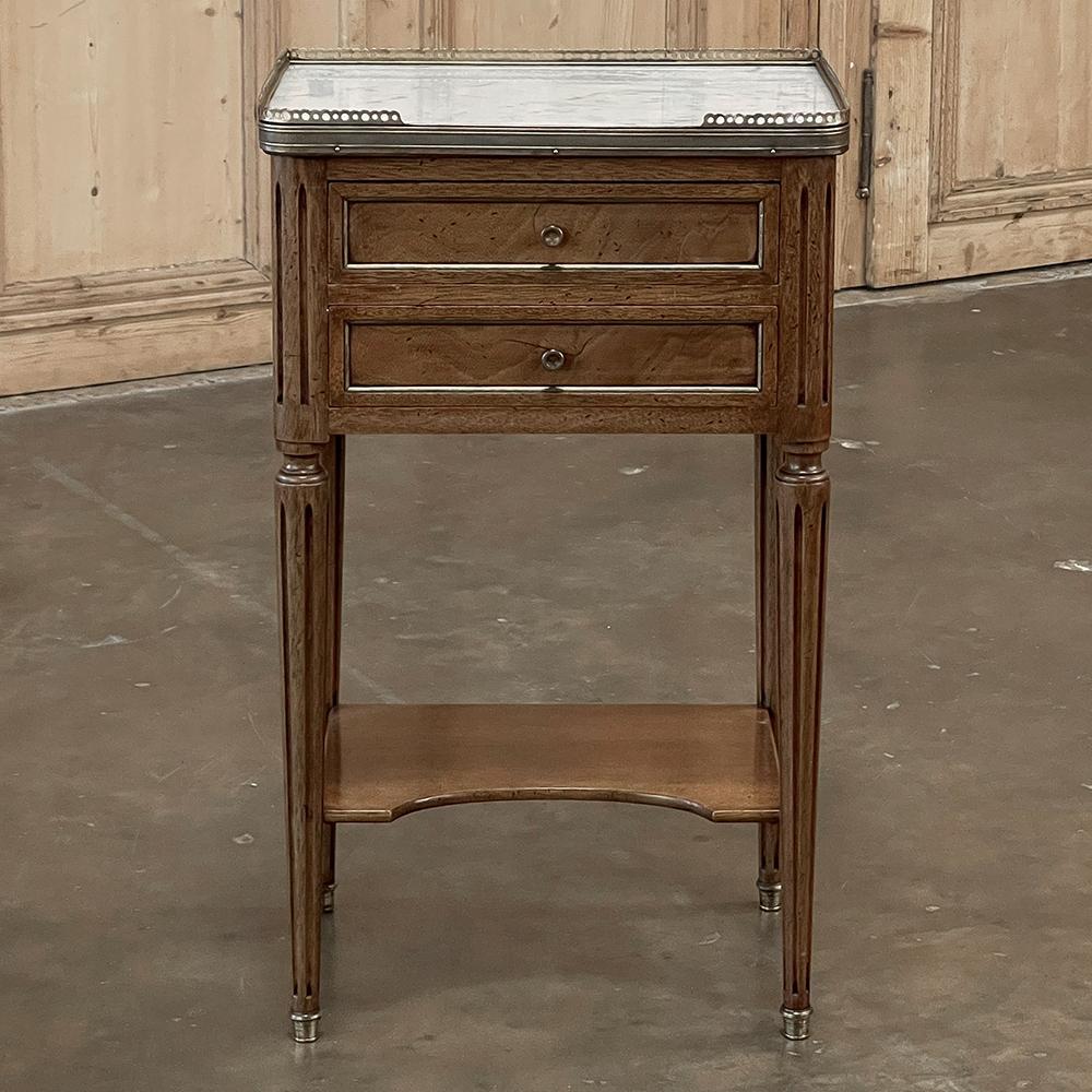 19th century French Directoire neoclassical marble top nightstand ~ end table is stately elegance on a diminutive scale defined! Topped with luxurious carrara marble, it features a pierced brass gallery all around to protect the stone's edges. The