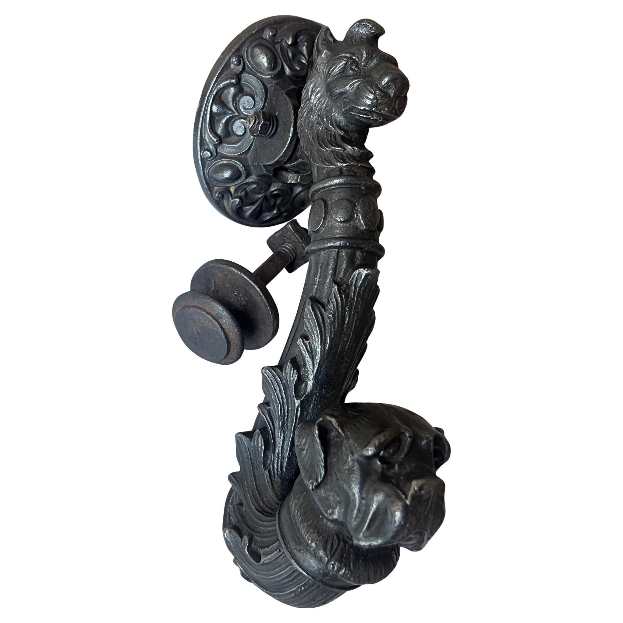 19th century French cast iron door knocker and back plate with face of bulldog.