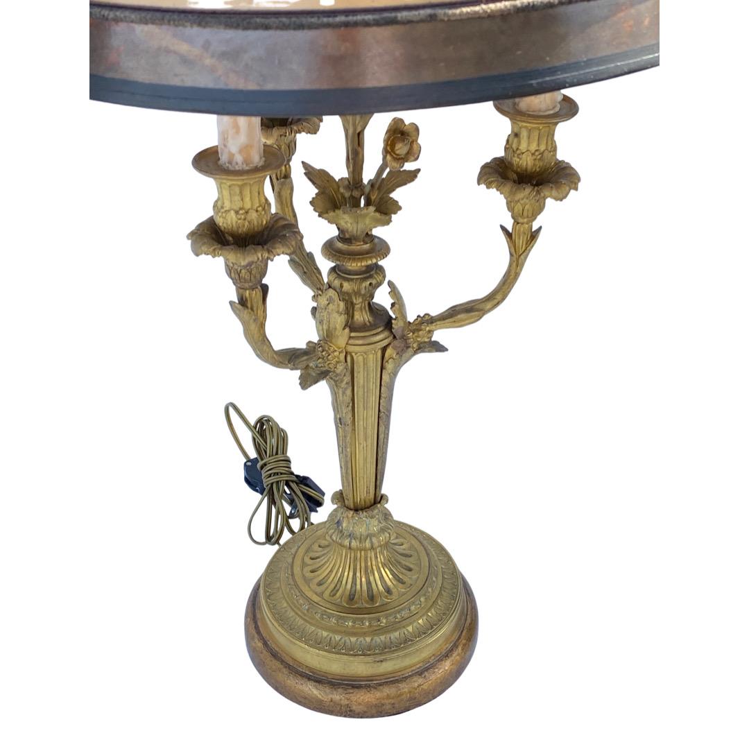 19th Century French candlestick lamps in a floral motif. Originally candlesticks converted to lamps. Custom parchment paper hand-painted shades.