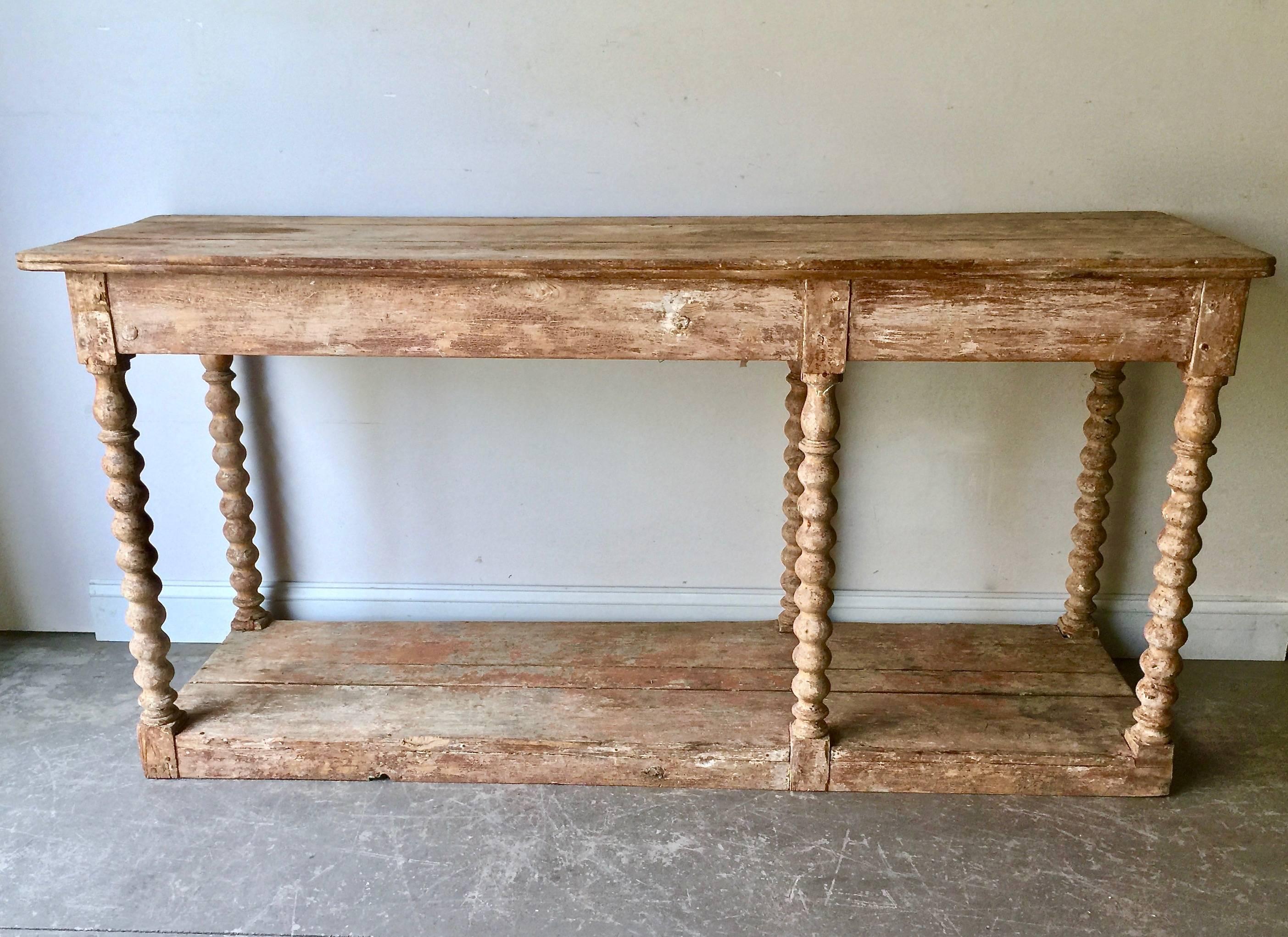 19th century French drapres table in wonderful time worn pine patina with three set of tuned legs.
 Surprising pieces and objects, authentic, decorative and rare items. Discover them all.