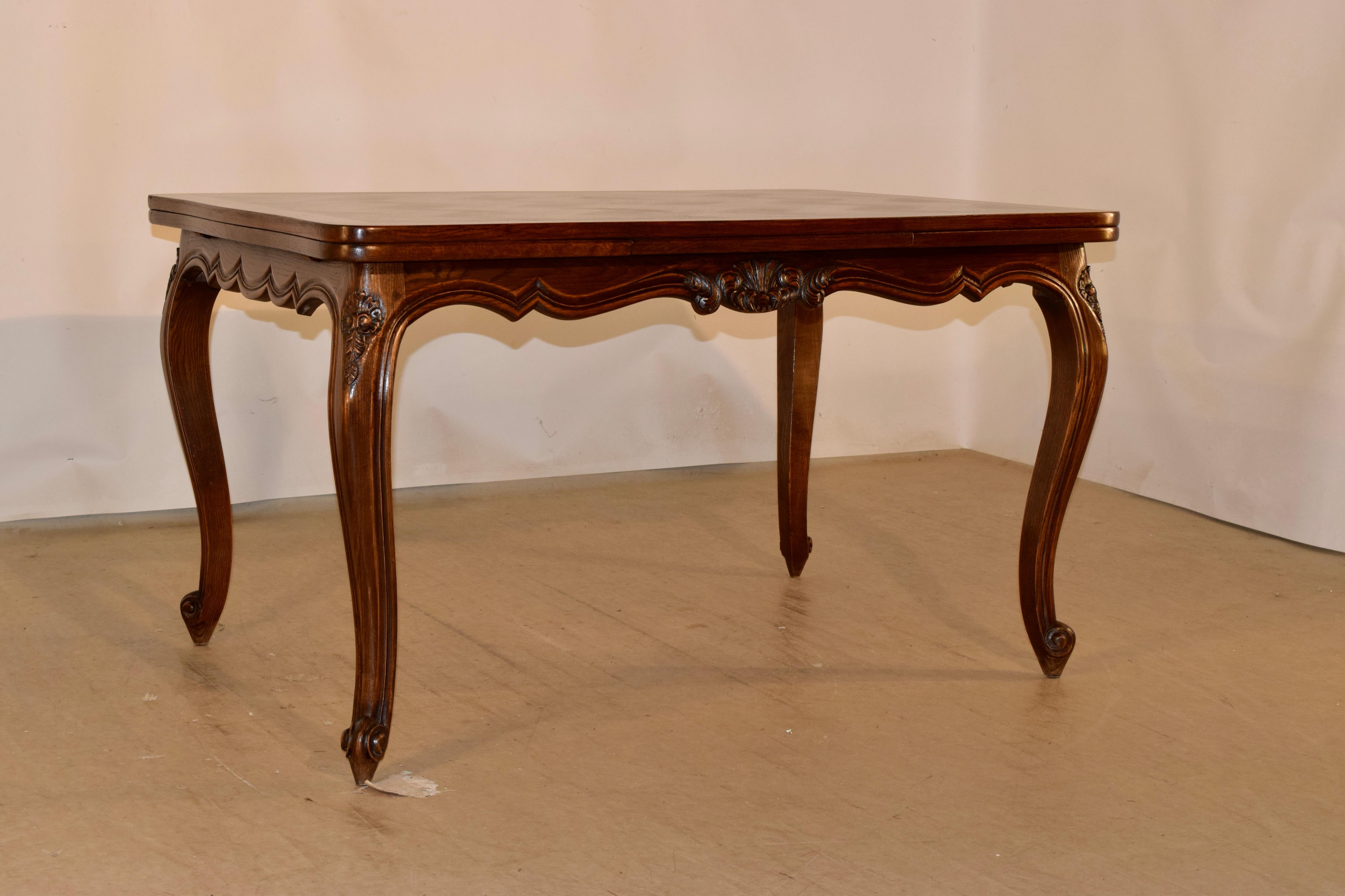 Hand-Carved 19th Century French Draw Leaf Table For Sale
