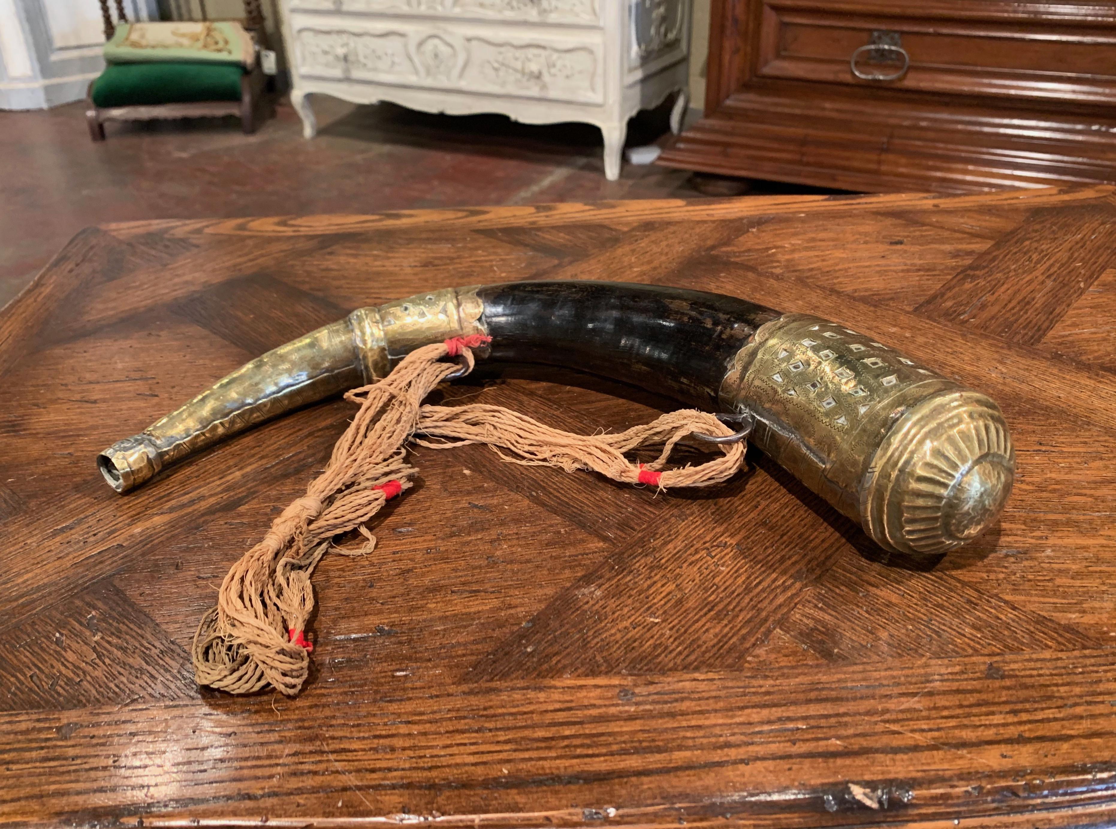 Decorate an office shelf with this antique Horn; crated in France circa 1850, the piece is made with a cow horn and embellished with copper mounts on both ends. The cornucopia shaped mounted object is in excellent condition with a rich patinated