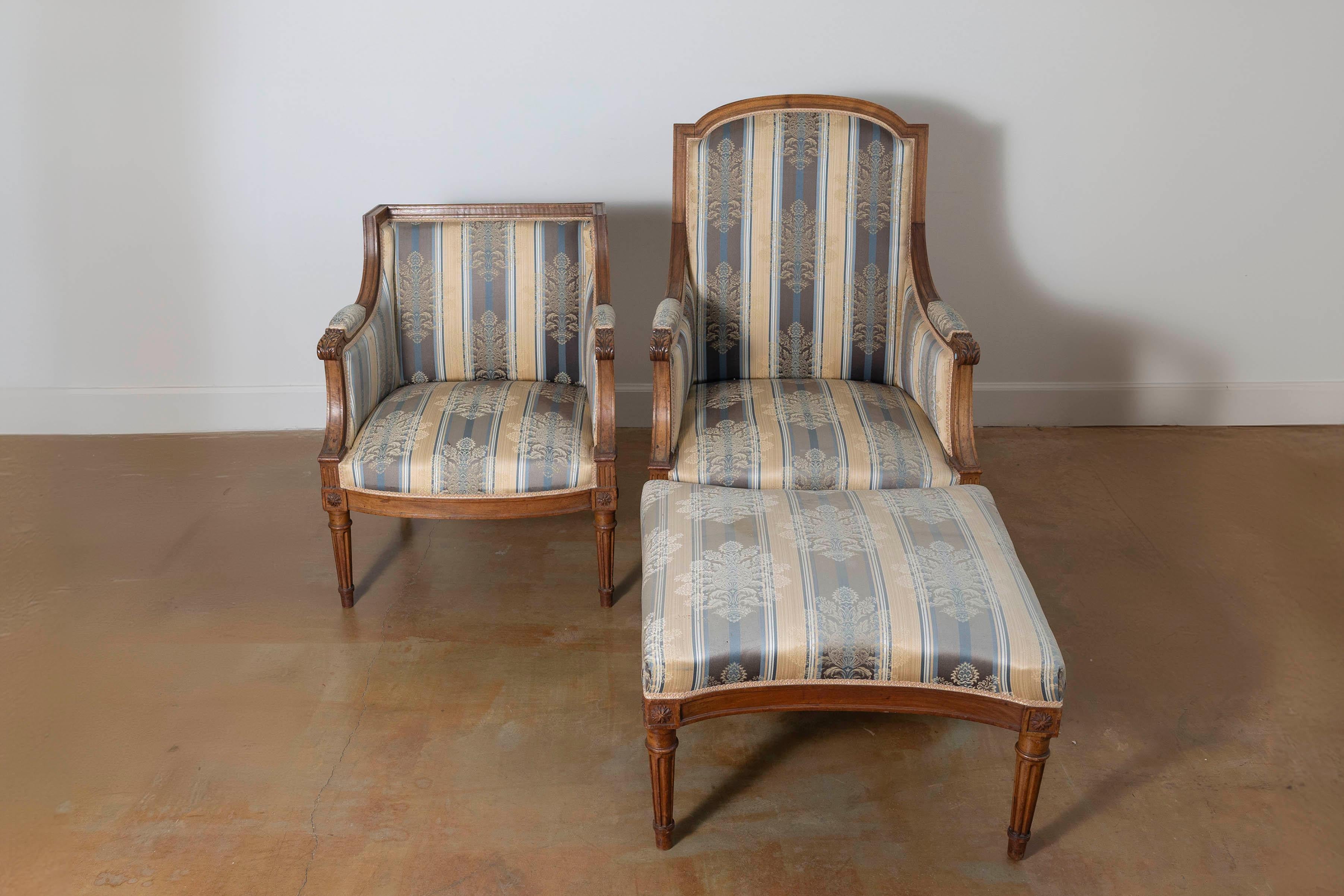 This 19th-century French Duchesse Brisée exudes timeless elegance and refined craftsmanship, making it a standout piece of Louis XVI-inspired furniture. The set includes two armchairs and a matching ottoman, designed to combine comfort and