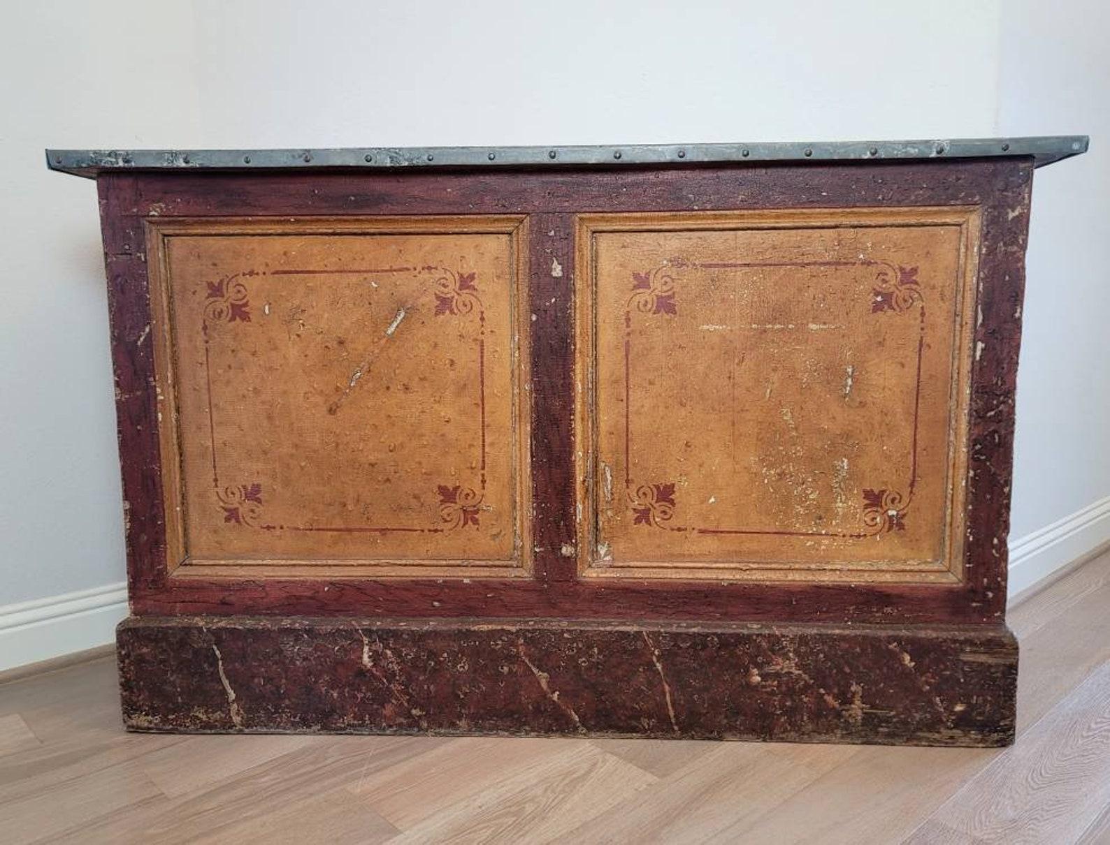 A rare, one-of-a-kind French industrial 19th century general store counter. 

Finished on all sides, today this most distinctive work of art would make for an impressive kitchen island, boutique retail shop counter, home media console or dry bar,