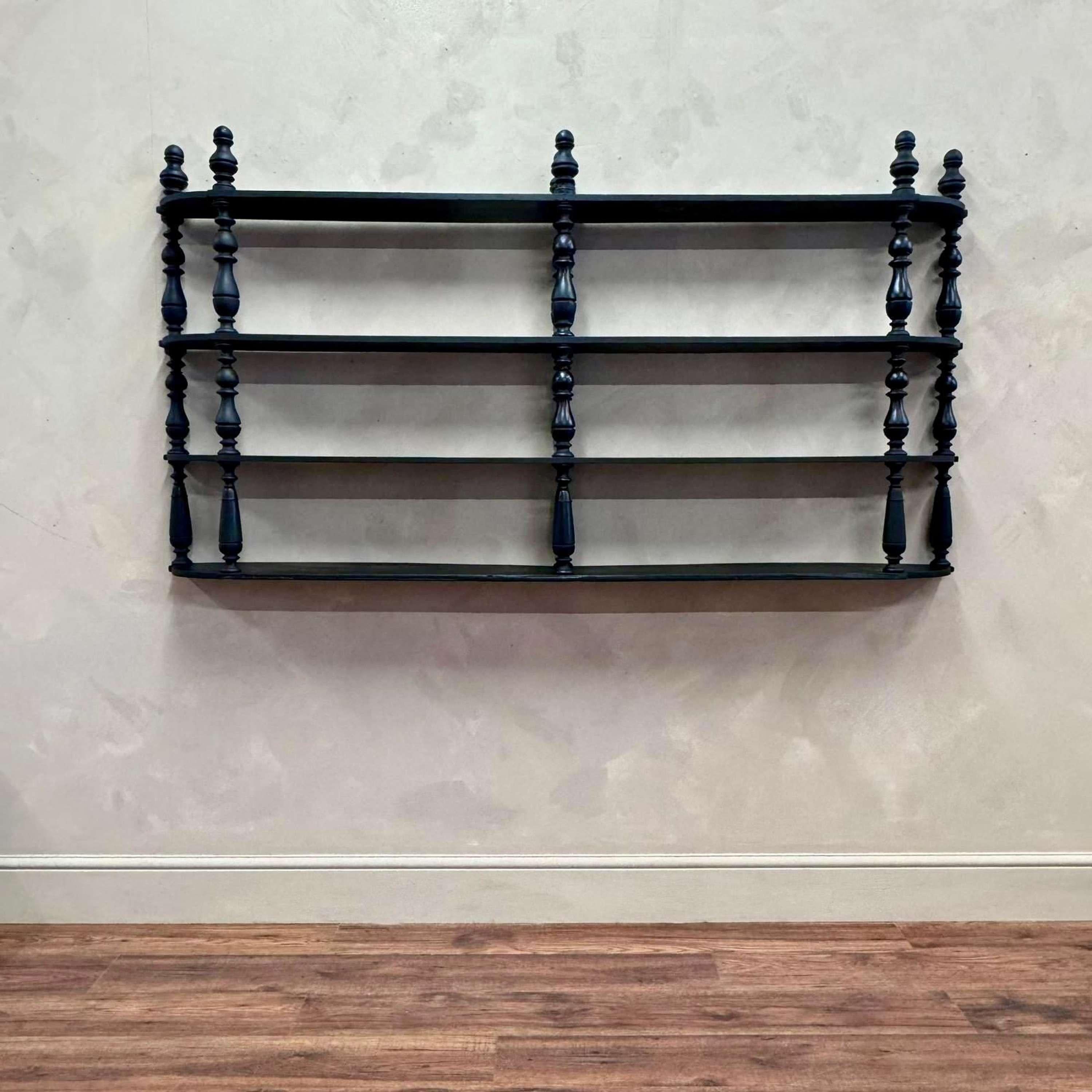 Large scale, French ebonised bobbin display shelves.
Usual wear commensurate with age (fully treated.)
France, circa 1920.

Length - 188.5 cm
Height - 99.5 cm
Depth - 19.5 cm