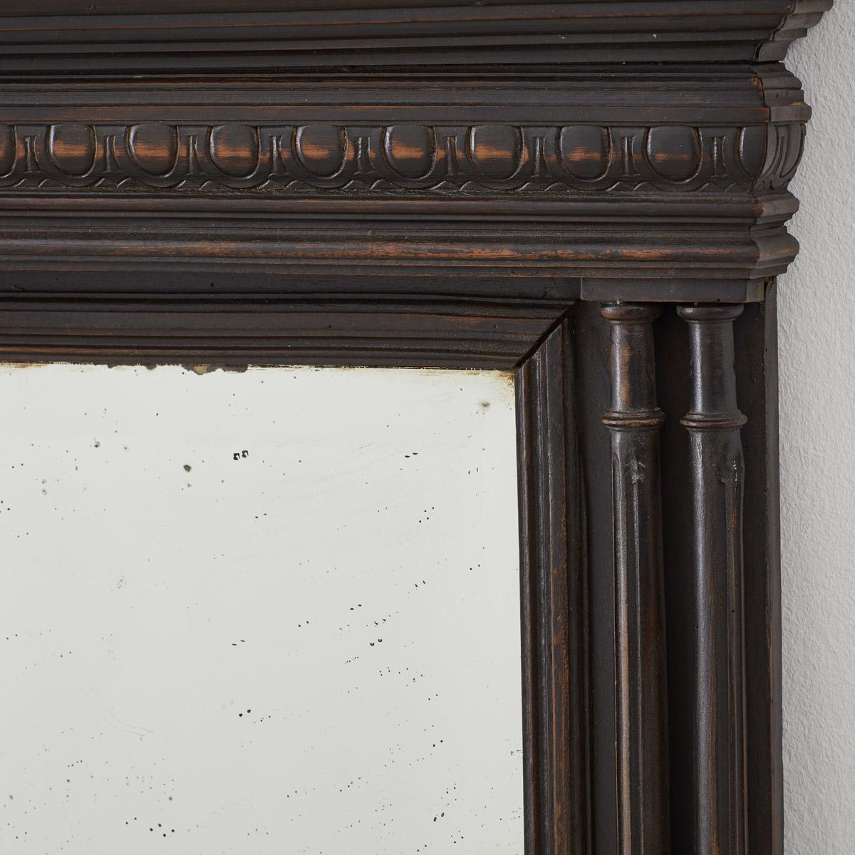 Wood 19th Century French Ebonised classical overmantel mirror For Sale