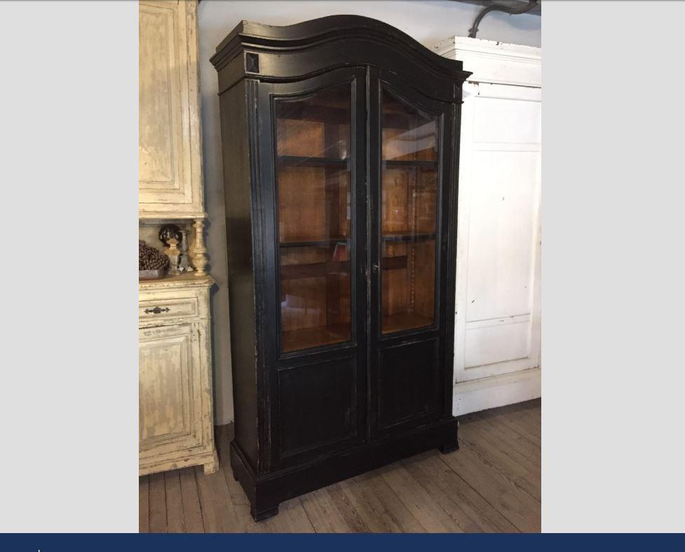 19th century French ebonized wood vitrine with shelves and drawers, 1890s.