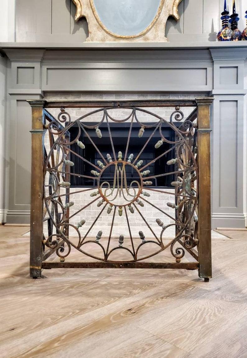 A rare and magnificent architectural ecclesiastical iron and bronze altar railing. Created in France in the 19th century, commissioned for a Victorian era church in French Gothic Revival taste, the three sided communion low rail or shrine sanctuary