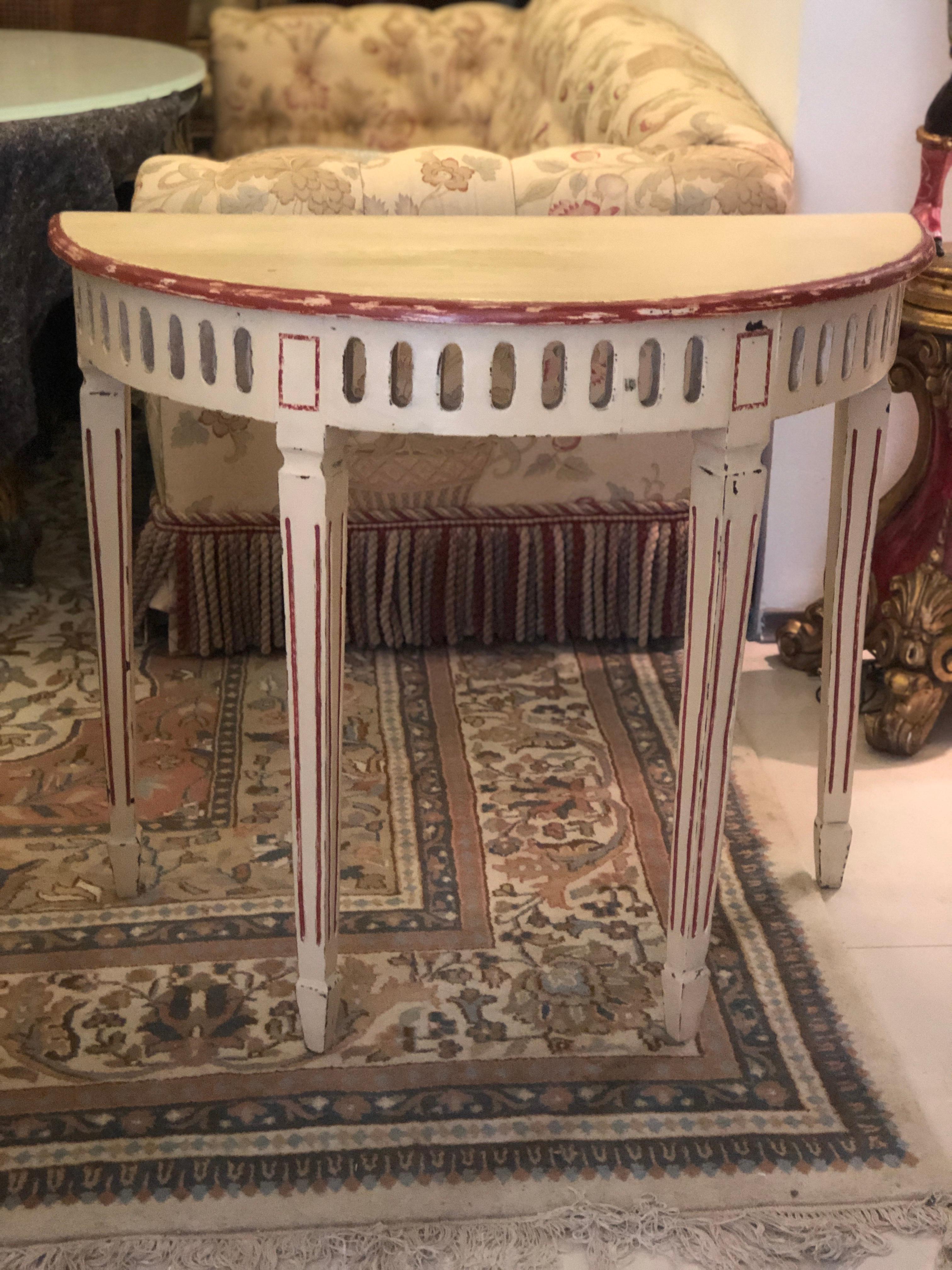 An elegant solid wood console, Louis XV style painted in light beige with coral accents. Made from carved wood, France, circa 1870.