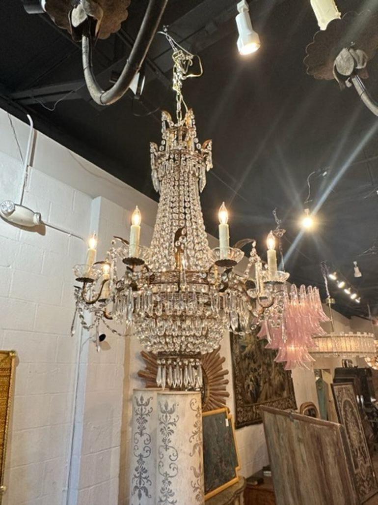 Exceptional late 19th century quality French Empire crystal and gilt brass basket form chandelier. A classic beauty that is sure to impress!!