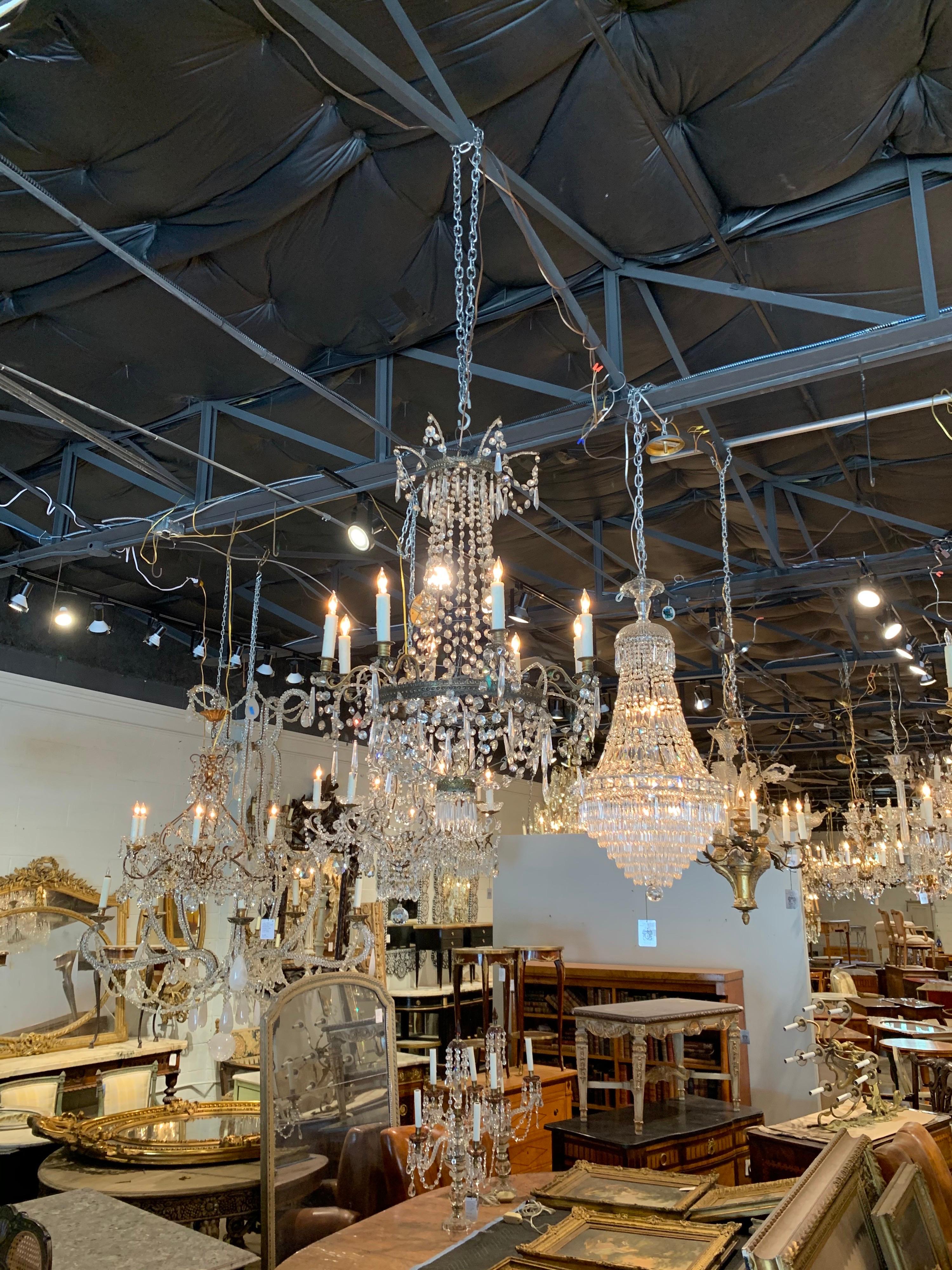 Exquisite 19th century French Empire beaded crystal and gilt bronze chandelier. Beautiful crystals and basket shape along with 8 lights. So lovely!