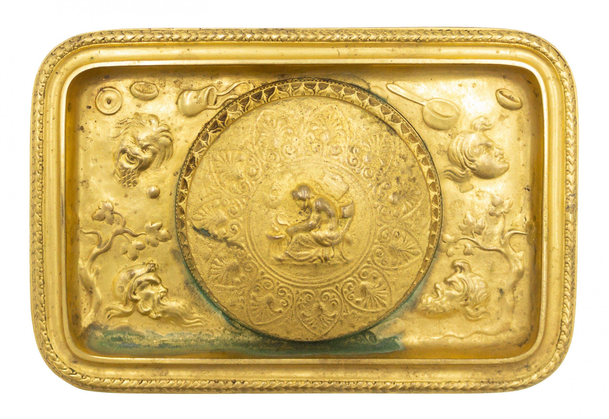 French Empire-style (19th century) bronze dore rectangular inkwell on 4 clawed feet with relief (signed BARBEDIENNE).
 