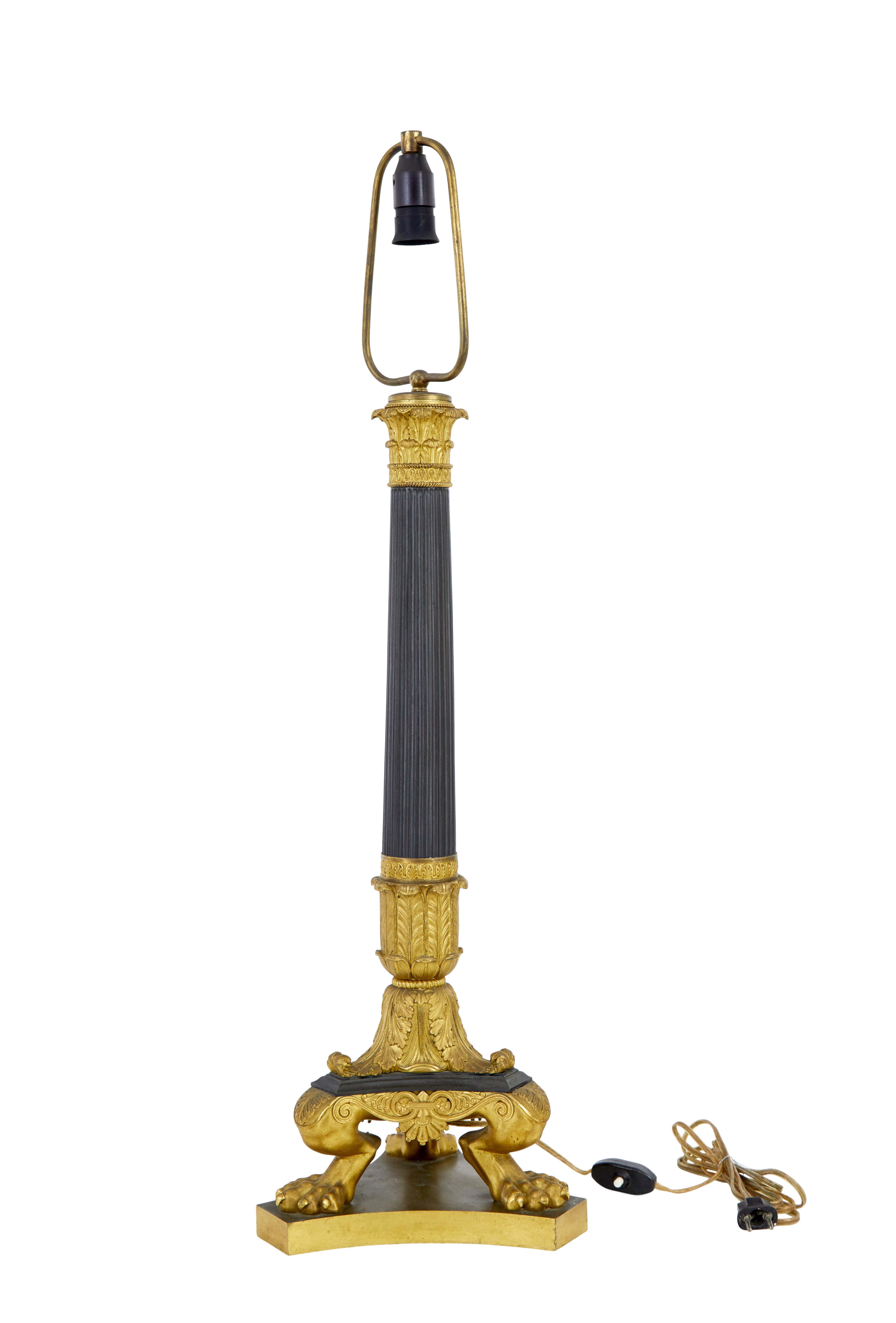 Tall 19th century french empire bronze ormolu lamp, circa 1860.

Here we have a lamp of the finest quality, previously would have been a gas lamp but converted to electricity in the 1930's.

Large lamp with fluted bronze column with triform base,