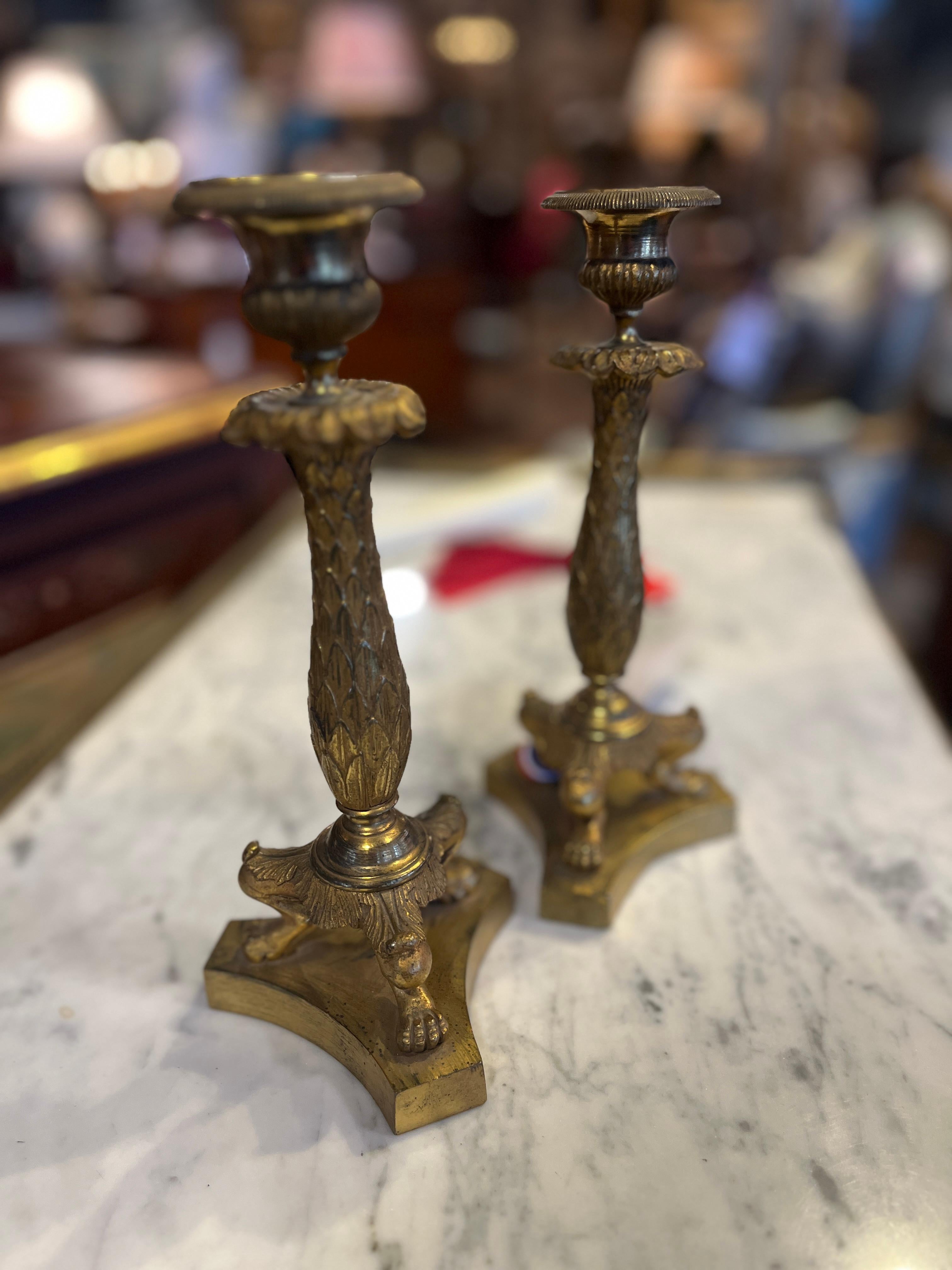 19th Century French Empire Candlesticks. Beautiful pair purchased in France. Age appropriate wear, see detailed photos or message us with questions. 