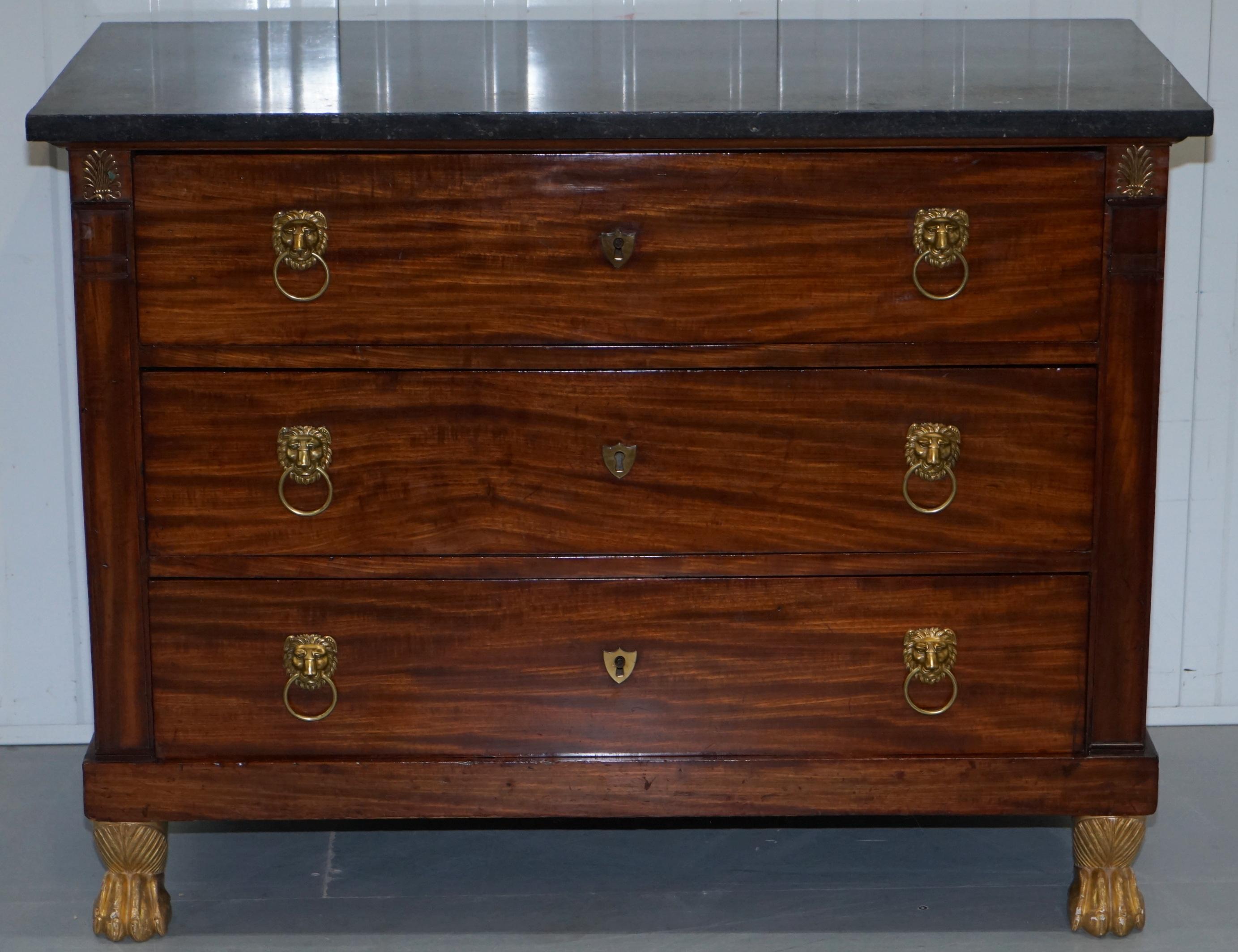 We are delighted to offer for sale this stunning French Empire, circa 1860 solid mahogany chest of drawers with marble top and gold leaf painted lion hairy paw feet

A very good looking well made and decorative piece of furniture. The timber