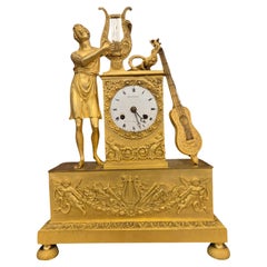 Orologio impero francese del XIX secolo in bronzo dorato, firmato Grandvoinnet
