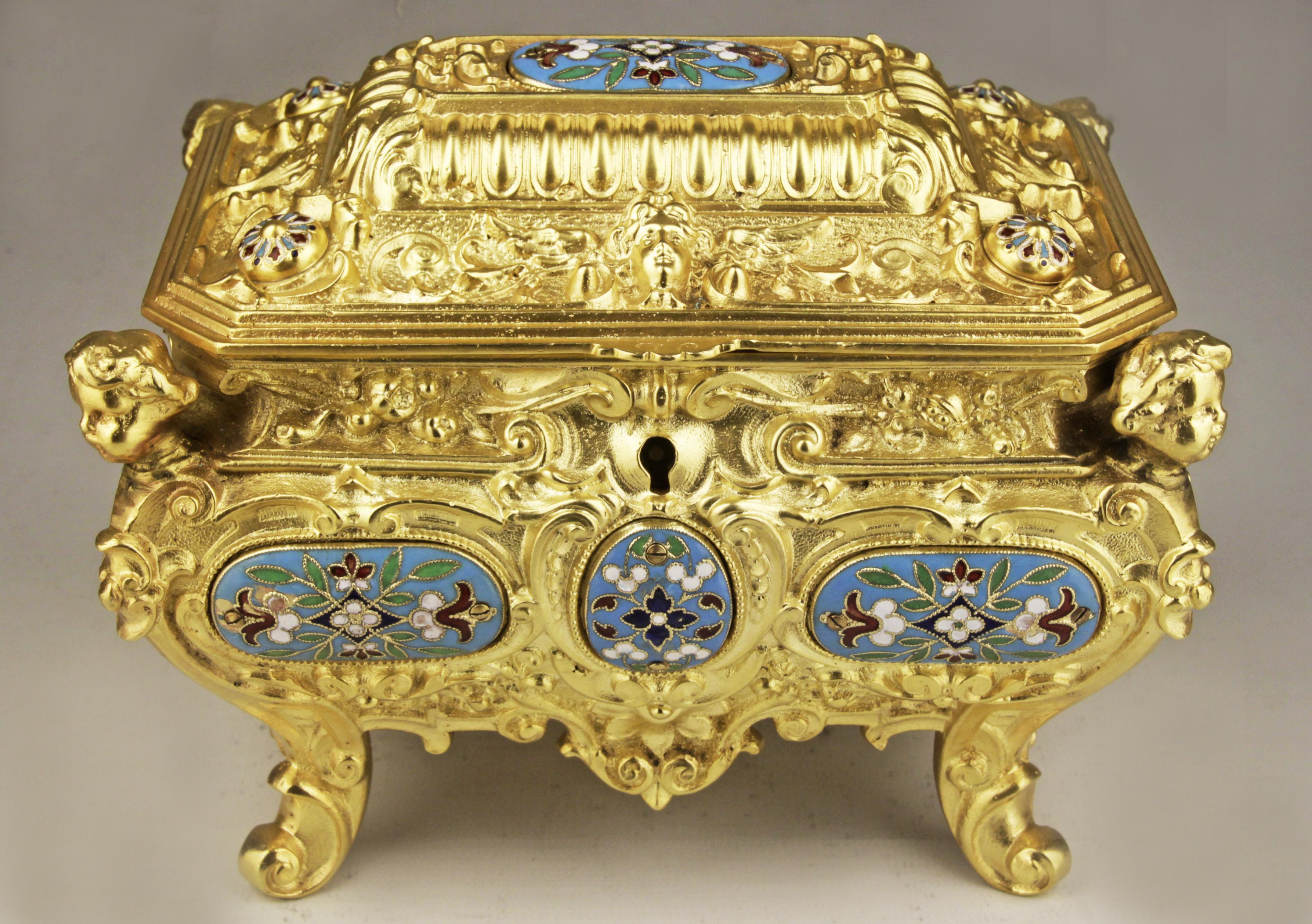 19th century French Empire cloisonne bronze jewelry casket with blue velvet interior

By: unknown
Material: bronze, velvet, enamel, metal, copper
Technique: gilt, cloisonné, champlevé, cast, molded, metalwork
Dimensions: 5 in x 7 in x 6 in
Date: