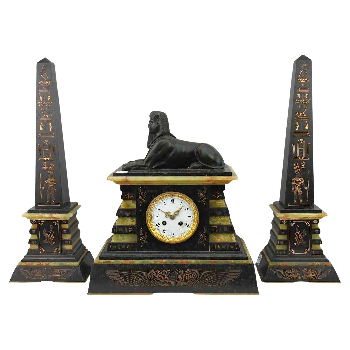 19th Century French Empire Egyptian Style Mantel Clock and Obelisks Set