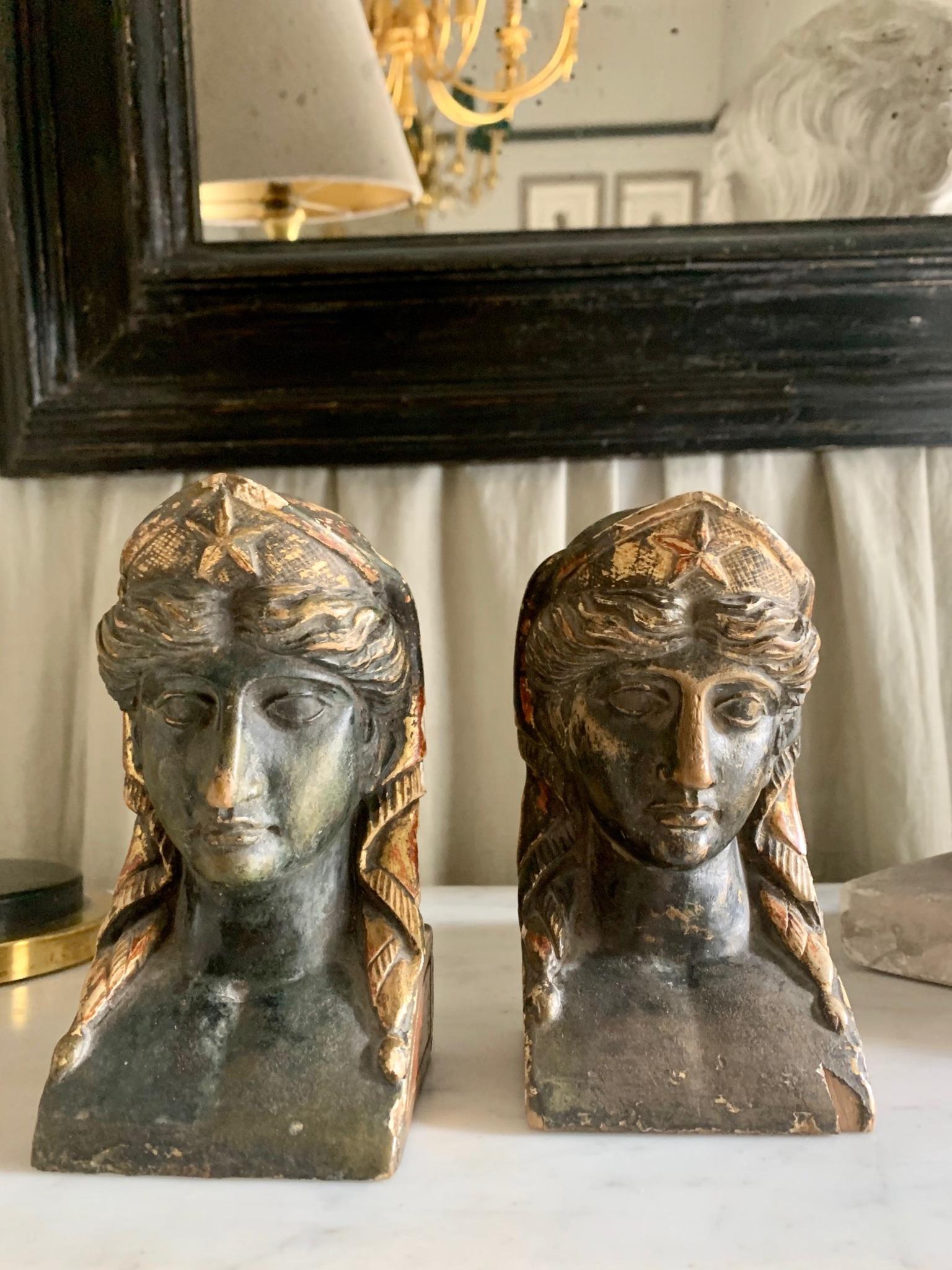 Pair of sphinx heads, French empire era in gilded and polychrome wood, surely they were part of an empire furniture.