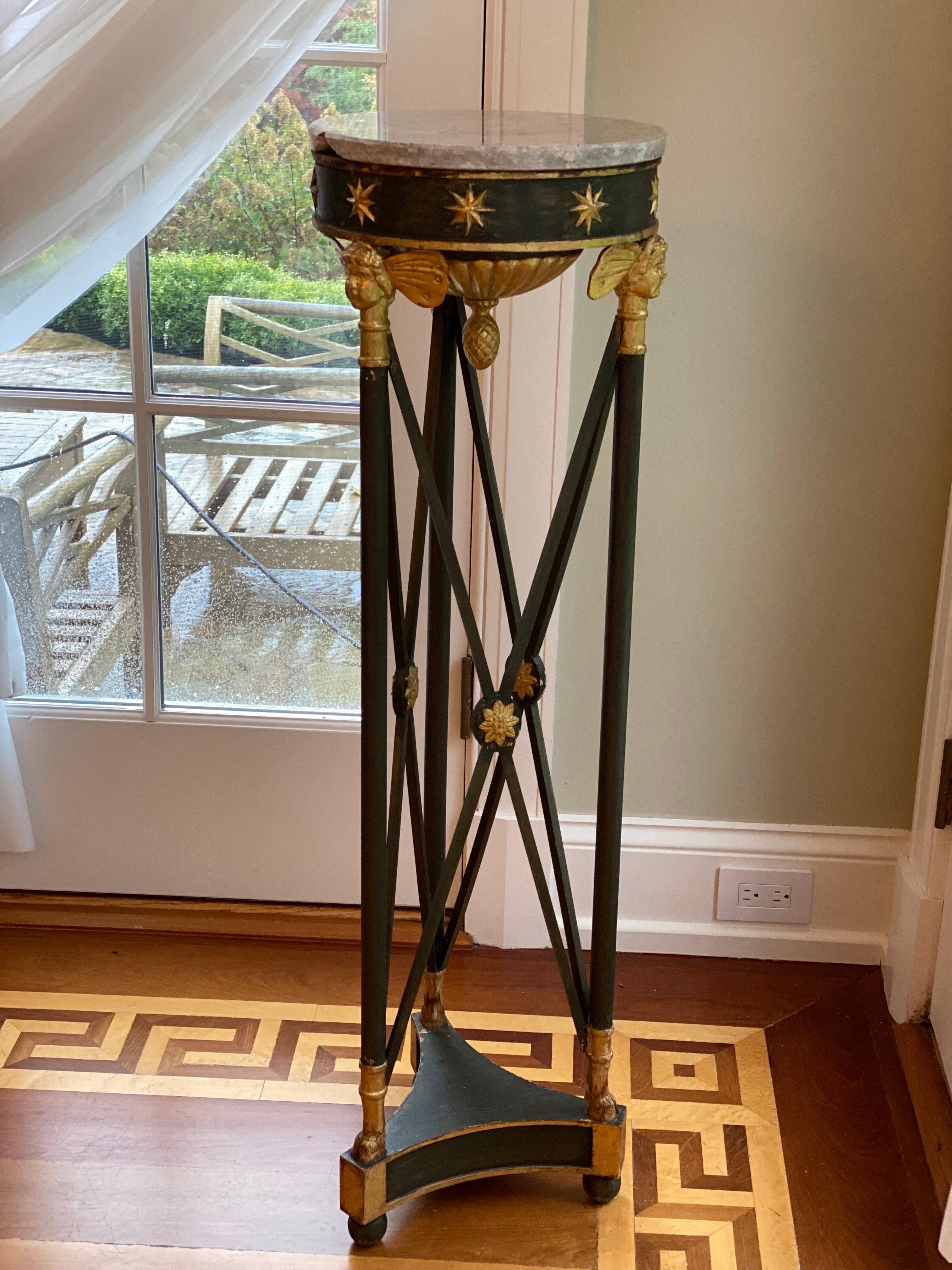 19th Century French empire green painted & giltwood pedestal.
Beautifully carved gilded stars, faces, rosettes, and architectural details on this green painted wood French pedestal. A beautiful piece that could use a new piece of marble or used