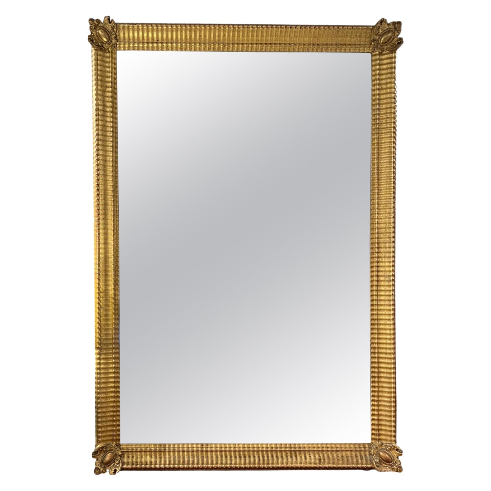 19th Century French Empire Large Ripple Mirror with Medallion Corners For Sale