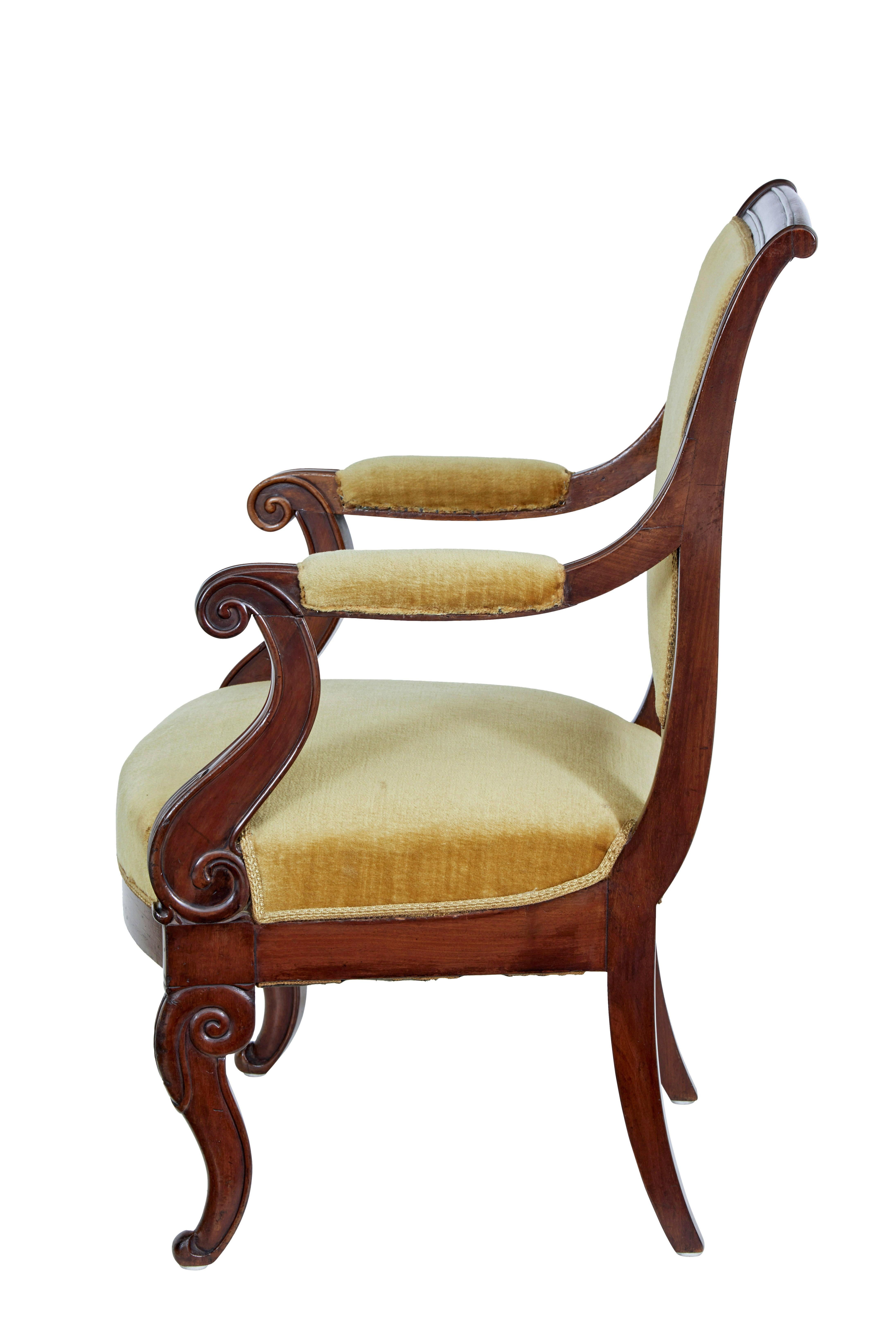 19th century french empire revival mahogany armchair, circa 1860.

Single french armchair made in mahogany. Shaped back linking to the padded armrests and scrolled arms. Front scrolled legs with tapering legs to the rear.

Upholstered in yellow