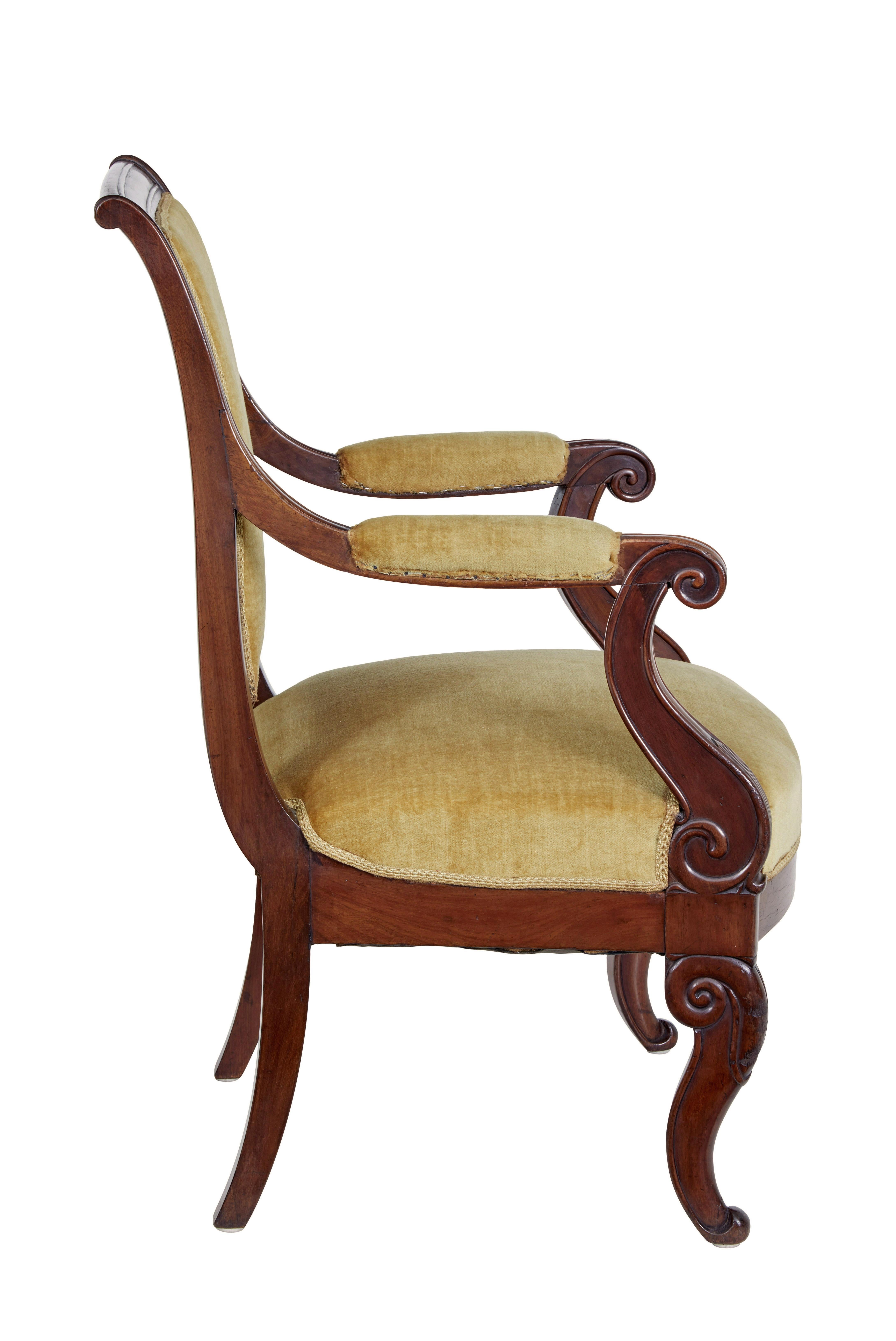 Carved 19th century French empire mahogany armchair For Sale