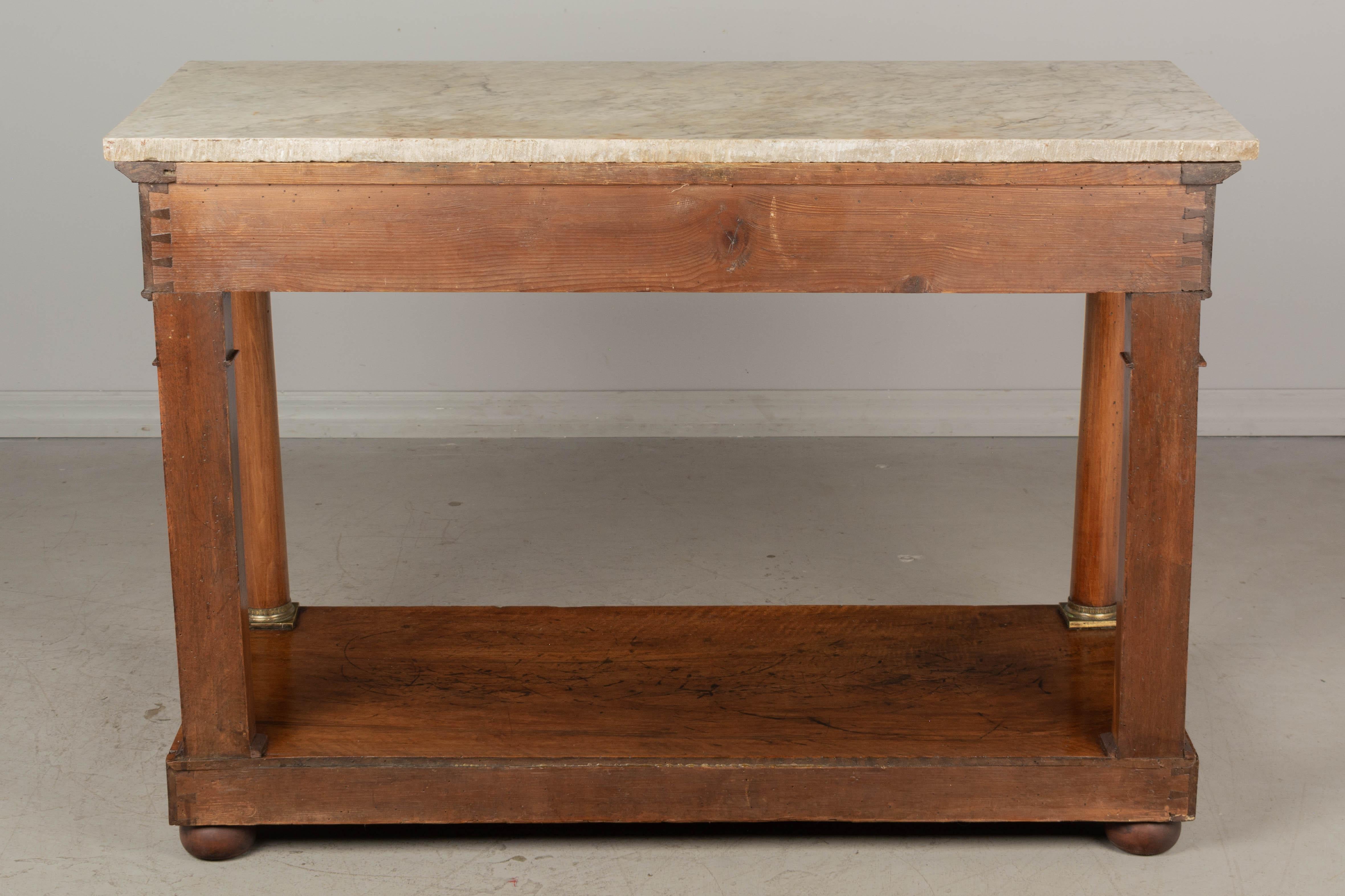 19th Century French Empire Marble-Top Console Tallado a mano en venta