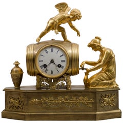 Early 19th Century French Empire Ormolu Mantel Clock "Pouring Wine"