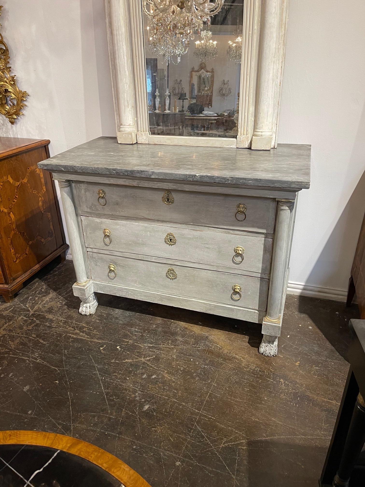 Elegant 19th century French Empire painted commode. Lovely grey color and pretty marble top. Nice lion shaped hardware as well. Fabulous! Better hurry on this one. It will go fast.