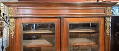 Bibliothèque Empire en acajou doré du 19e siècle