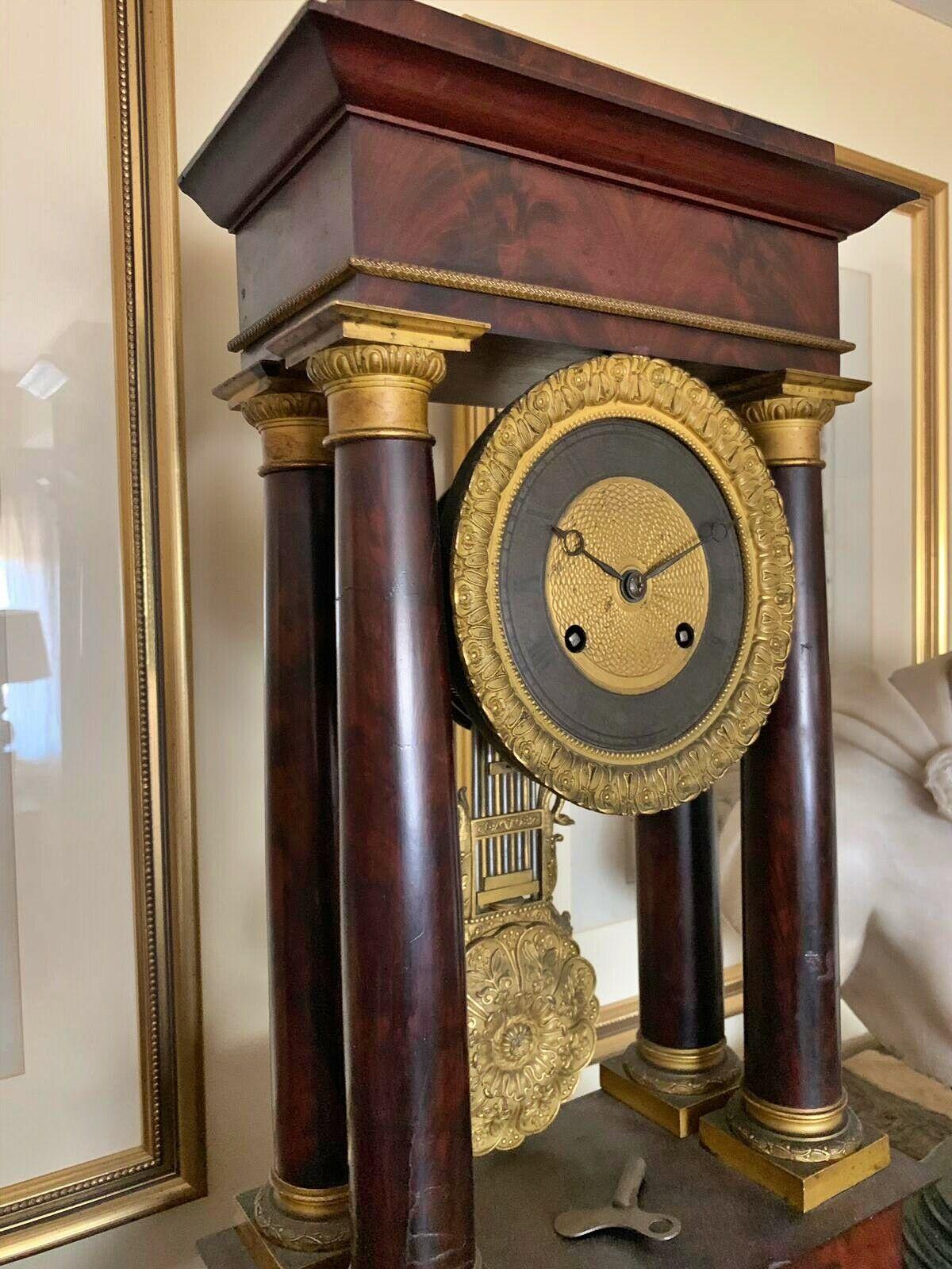 Hand-Crafted 19th Century French Empire Pendulum O'Clock For Sale