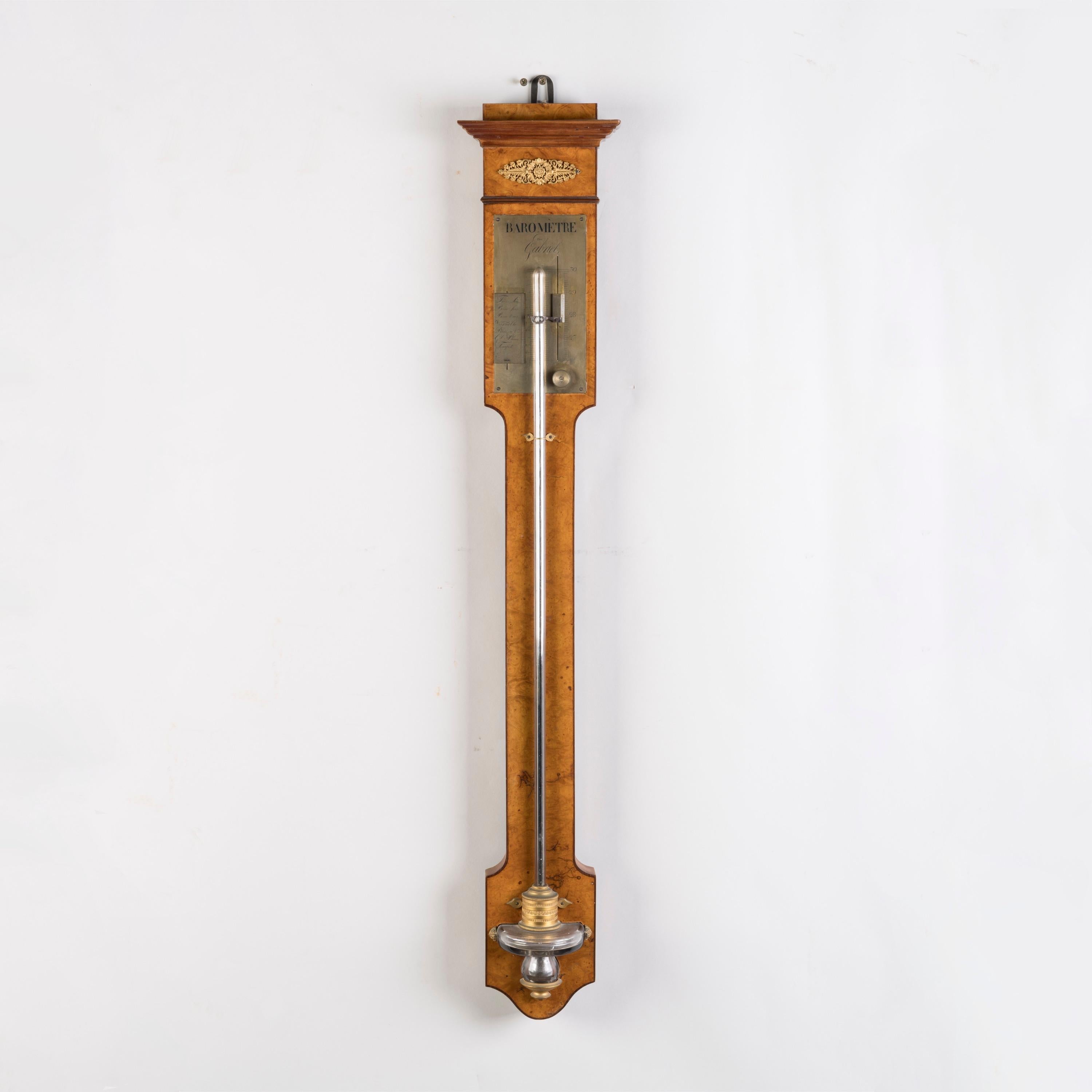 Empire Cistern Barometer by Gabriel

Of rectangular form, with the case waisted, veneered in burr elm with mounts in the manner of Percier and Fontaine, of cistern type, with bronze bulb guard mounts, showing the range from 'Tres Sec to Tempete'