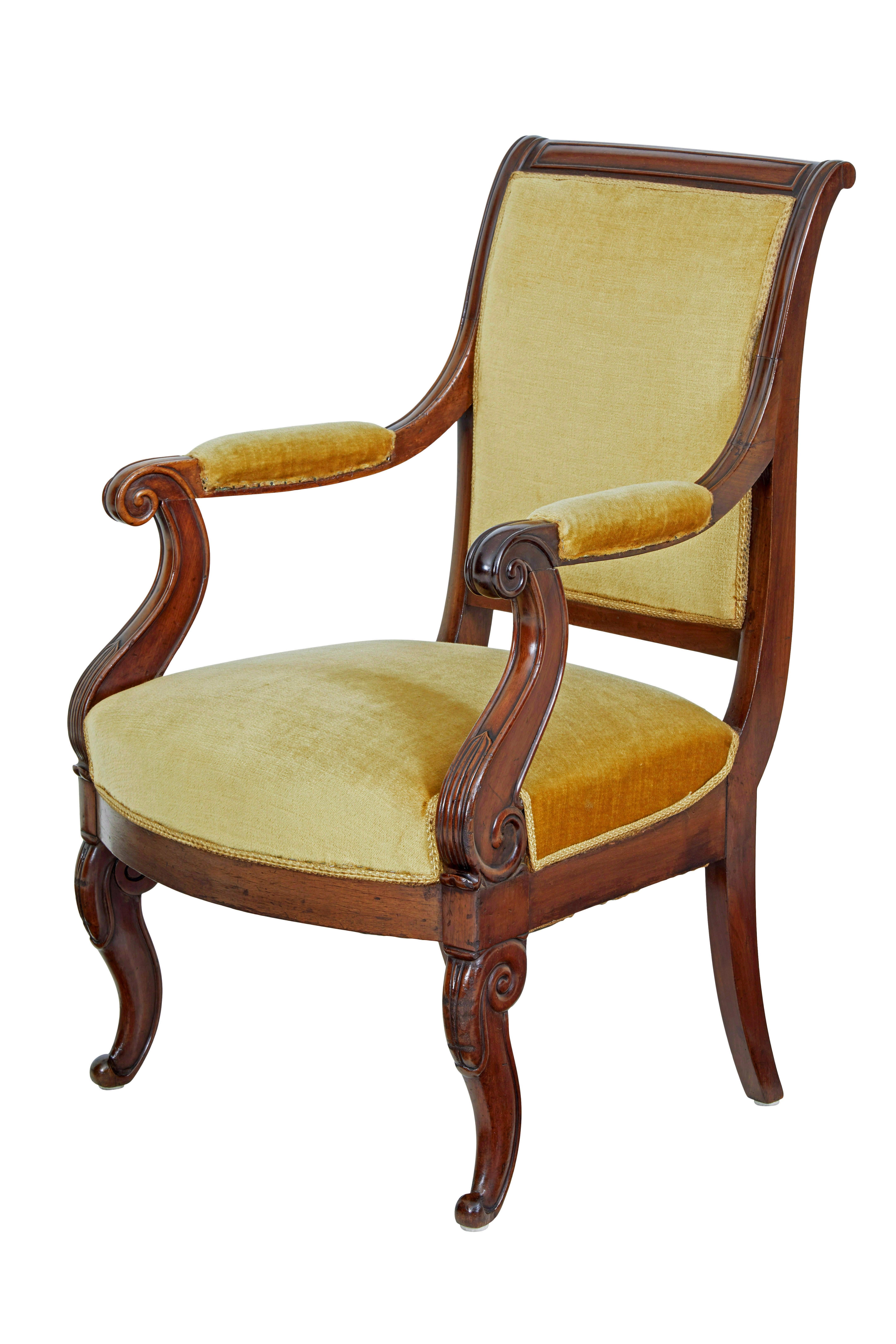 19th century french empire revival mahogany armchair, circa 1860.

Single french armchair made in mahogany. Shaped back linking to the padded armrests and scrolled arms. Front scrolled legs with tapering legs to the rear.

Upholstered in yellow