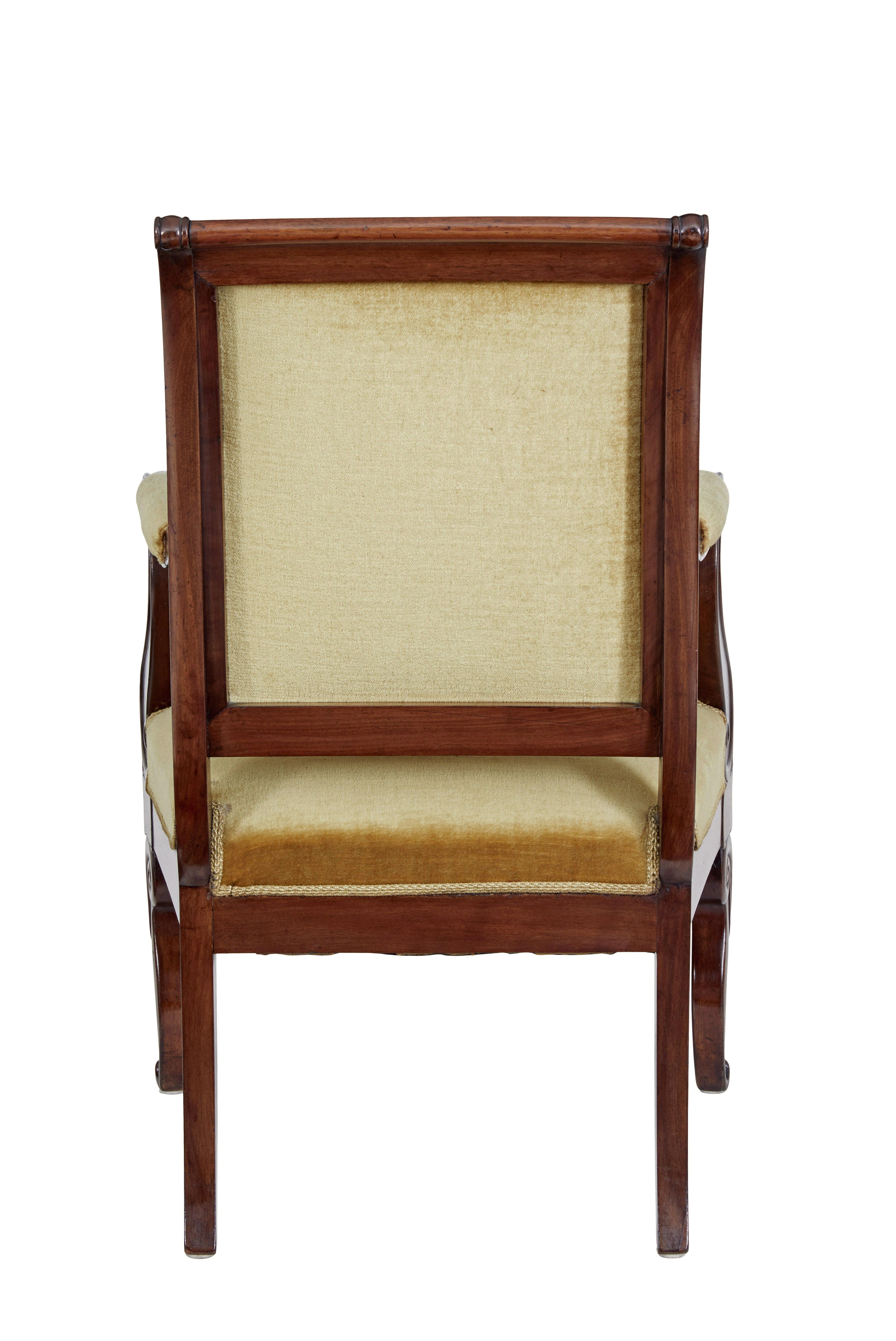 Carved 19th century French empire revival mahogany armchair For Sale