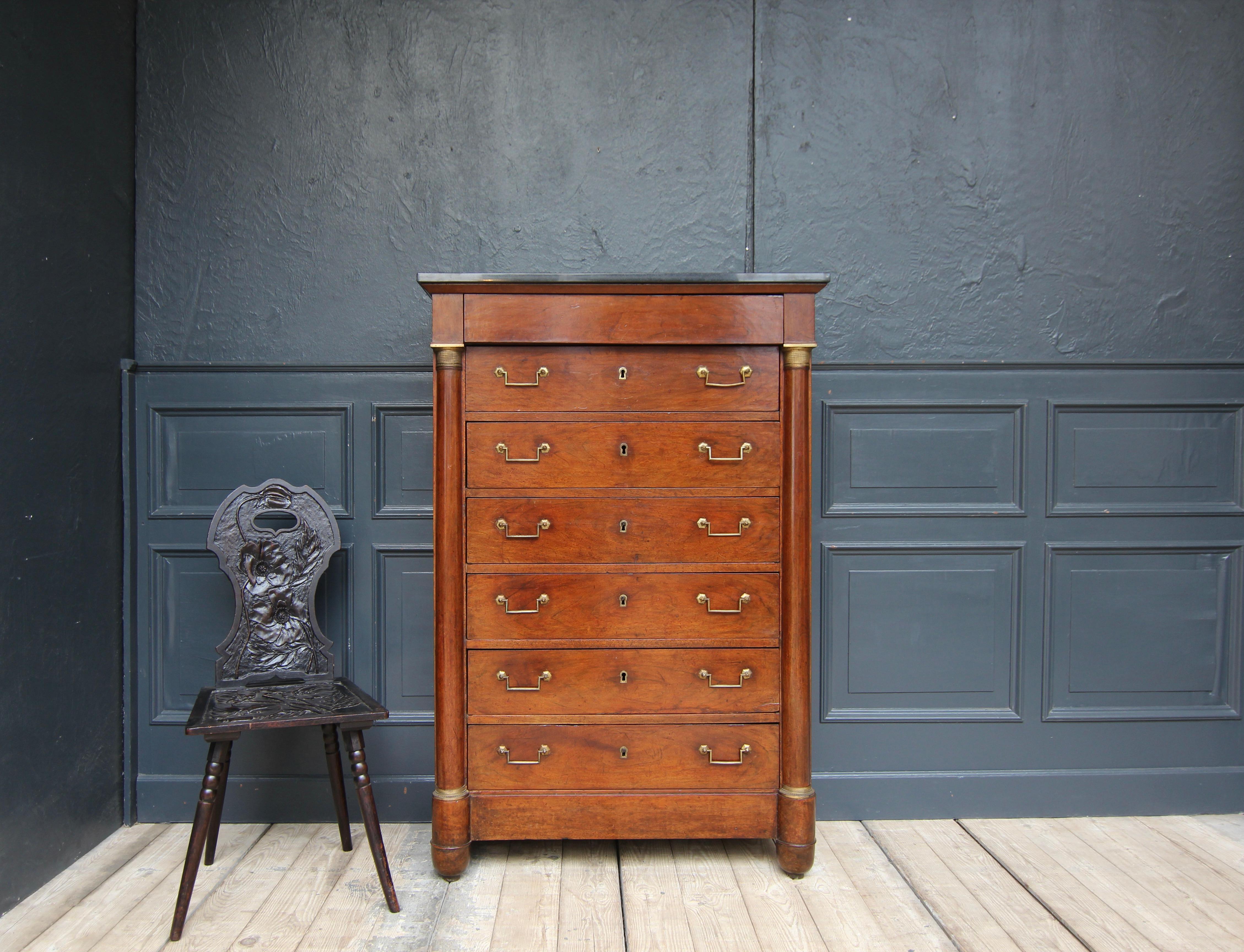 A 19th century French Empire high chest of drawers, so-called 