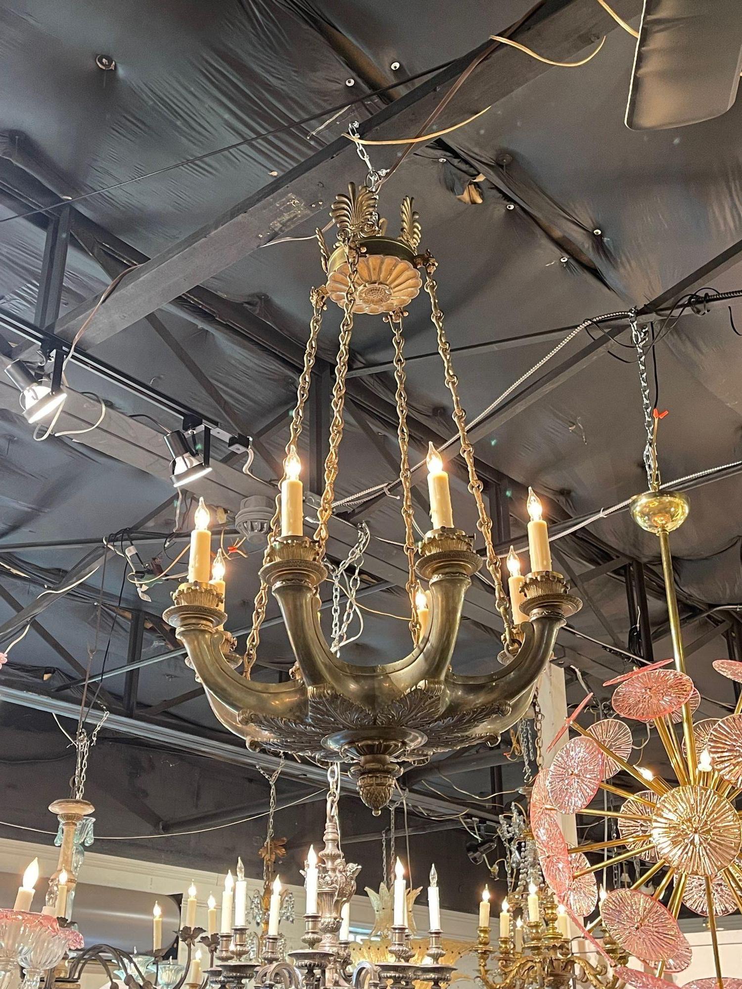 Handsome 19th century French Empire silver and bronze chandelier. Adds a real touch of elegance!