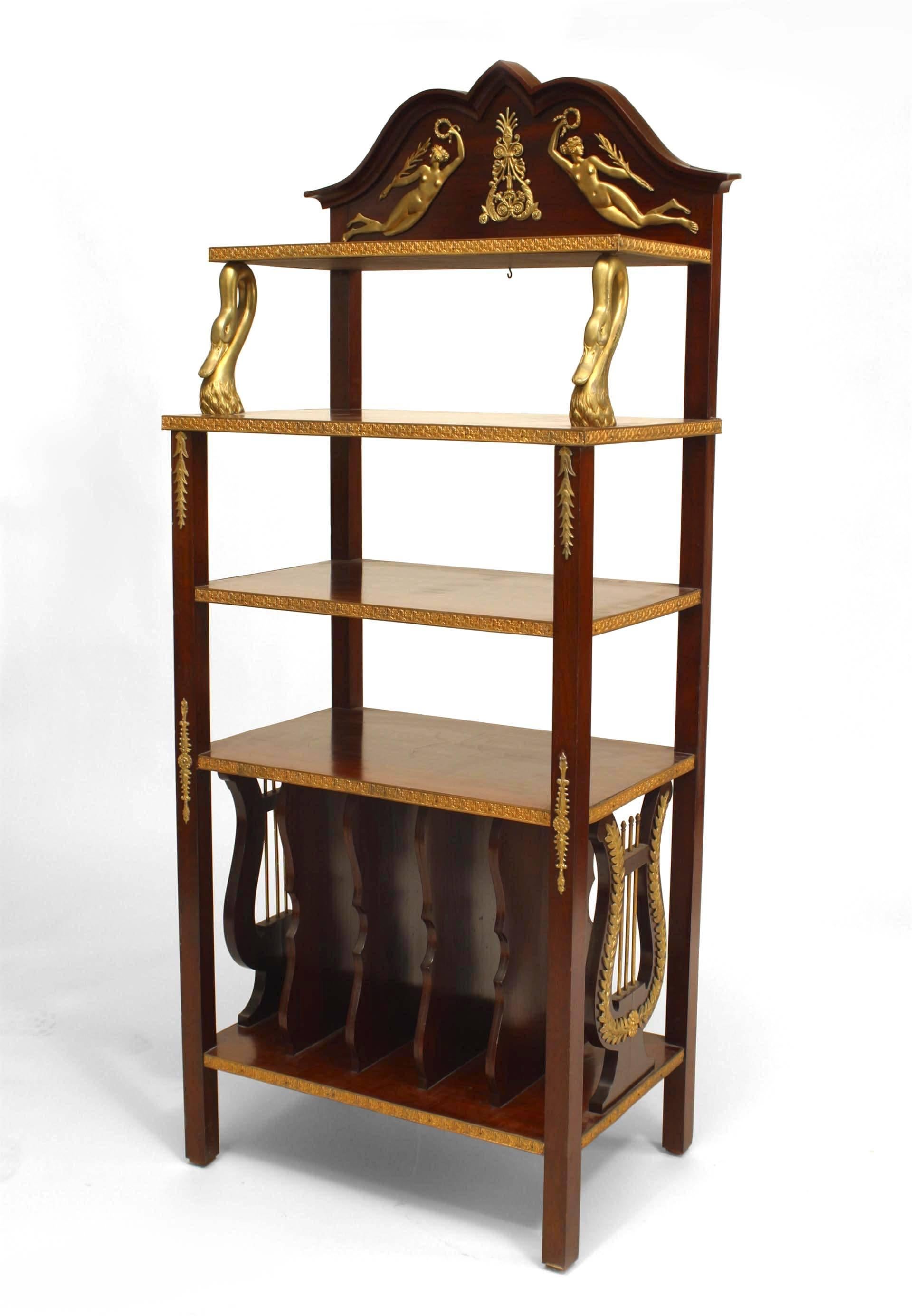 French Empire-style (19th Century) mahogany etagere with bronze trim and shaped back rail above shelves with lyre form sides.

