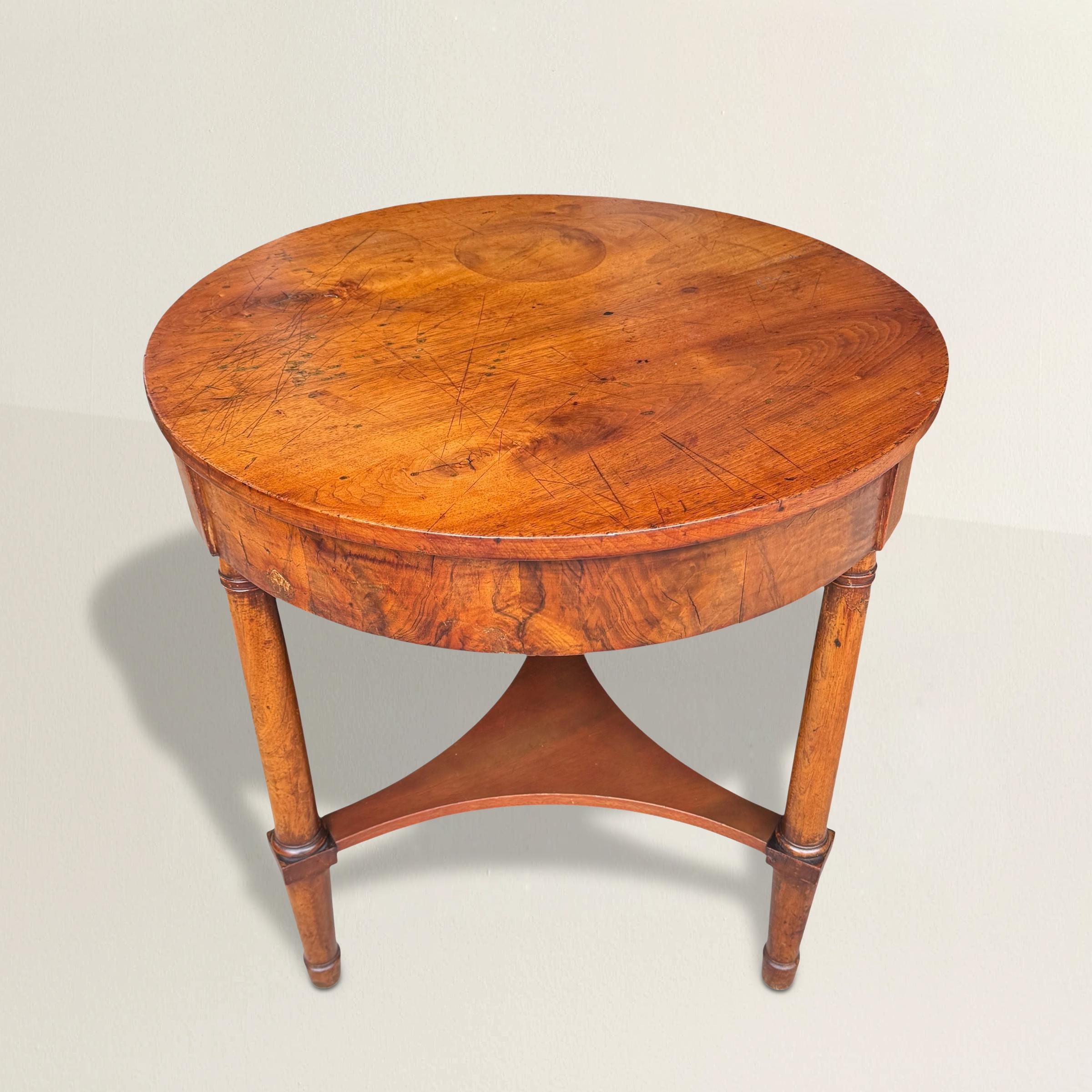 In the French Empire (1804-1815) period, grandeur was often measured in gilt bronze—sphinxes, swags, laurel wreaths gilded to catch the light. But every so often, a piece turns up that rewrites the rules of restraint. This mid-19th-century mahogany
