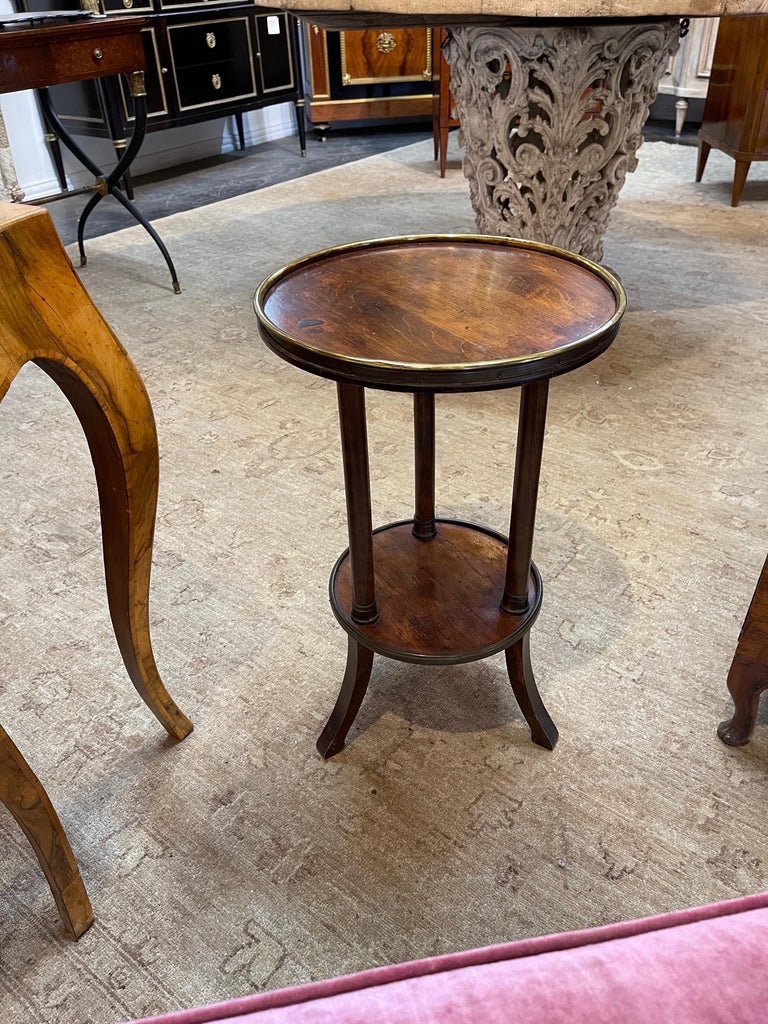 Very nice 19th century French Empire walnut and brass side table. A beautiful decorative accent piece!