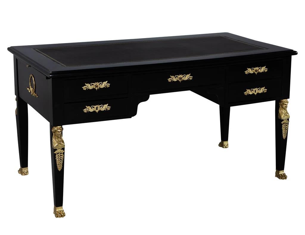 19th century French Empire writing desk with chair. Masterfully restored by the Carrocel team in a hand polished black lacquer finish and new leather. Listing includes matching chair, sold as a set.
Price includes complimentary curb side delivery