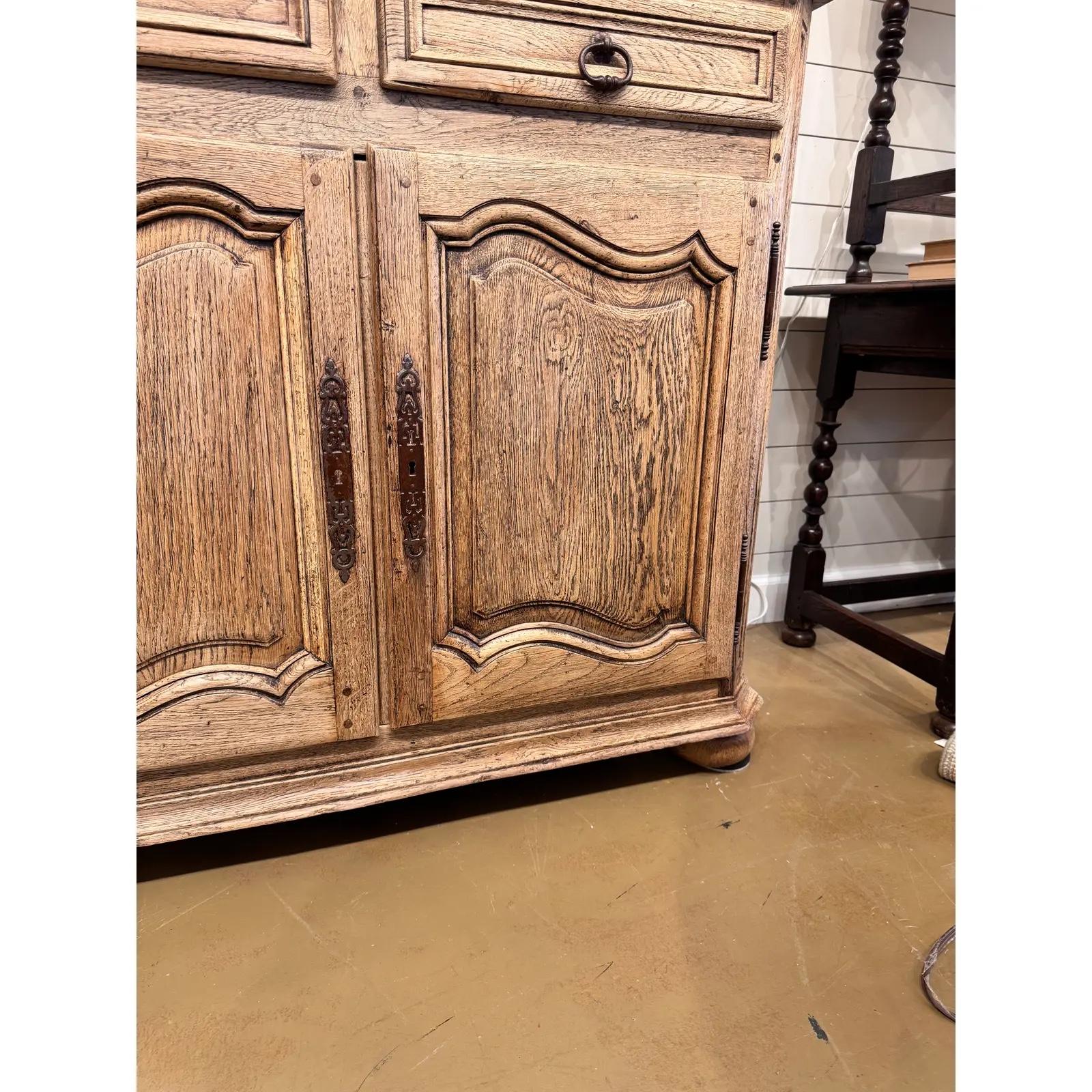 This is a beautiful 19th century French enfilade server. Lovely aged patina, and dark metal drop pulls knobs and backplated lower escutcheons. This large antique serving piece adds warmth, design and storage galore to any space! 

Dimensions
87ʺW ×