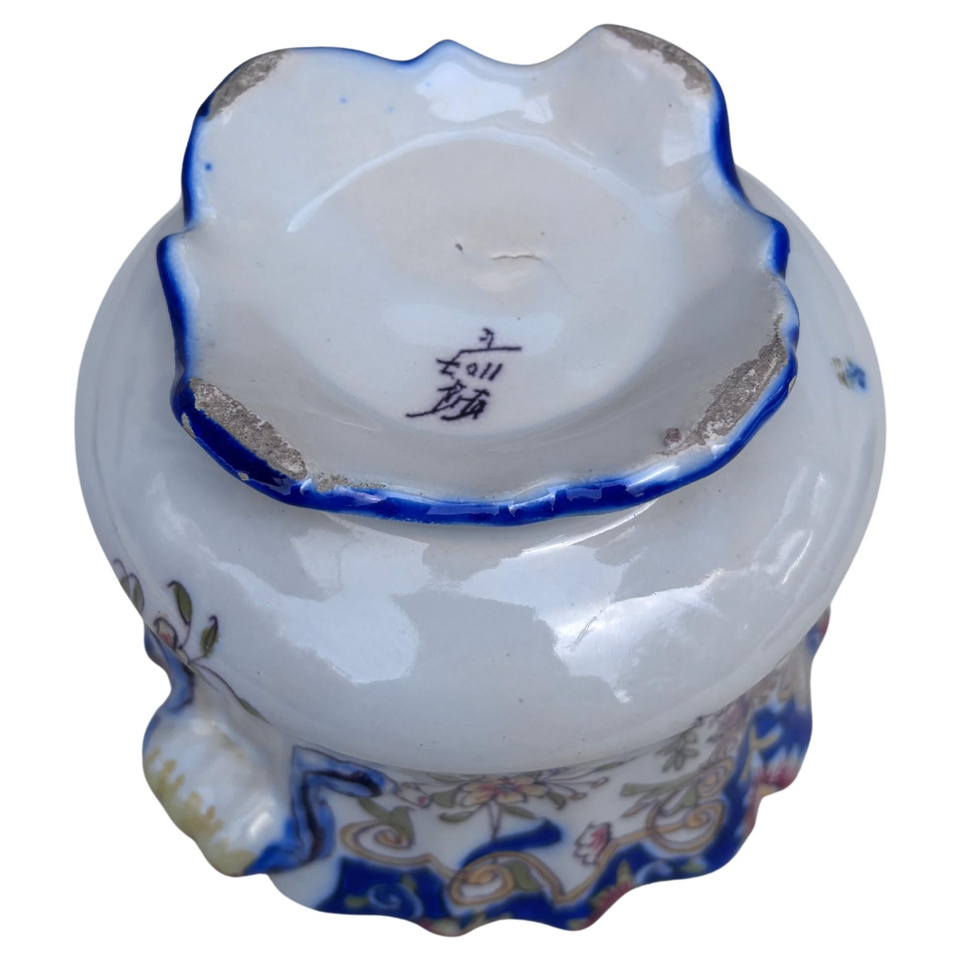 19th Century French Faience Cache Pot Desvres , hand painted with flowers on one side and coat of arms on the other side.