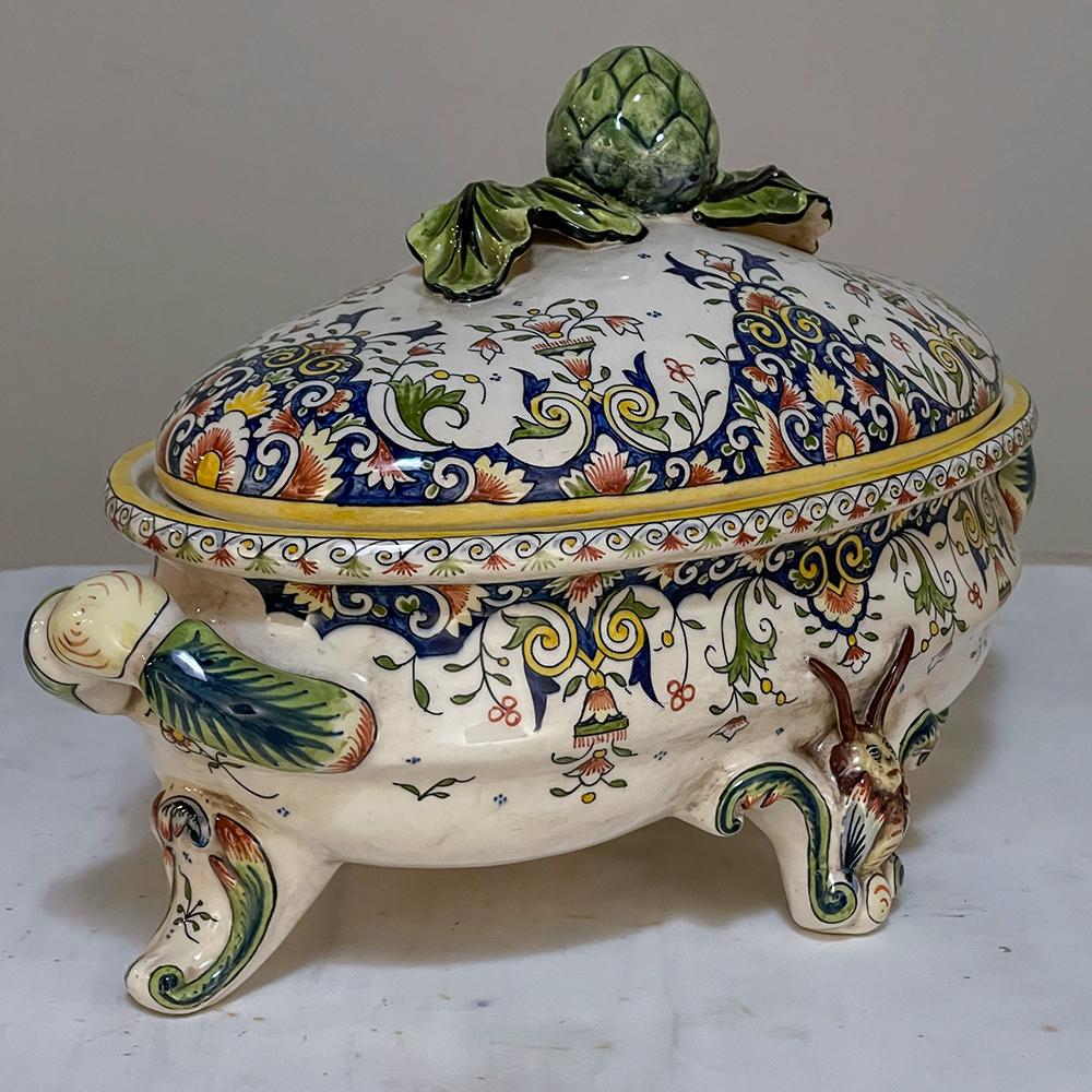 19th century French Faience hand-painted soup tureen represents the remarkably unique and definitively French porcelains produced in the fabled region around Rouen! Hand-made and meticulously hand-painted with an intricate design inspired by nature